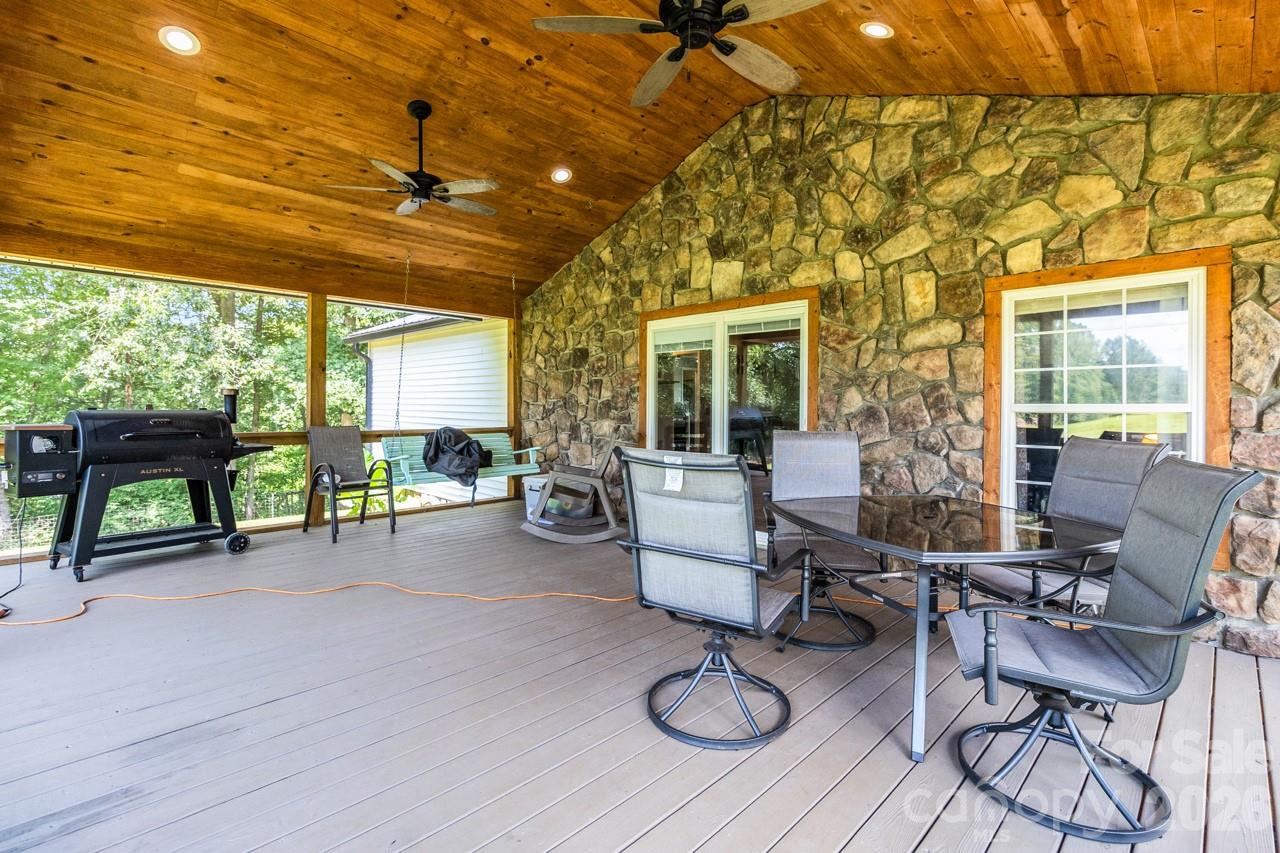View inside screen room.Beautiful wooden ceiling. Trex flooring. Ceiling fans - 393 Cedar Grove Church Road, Vale