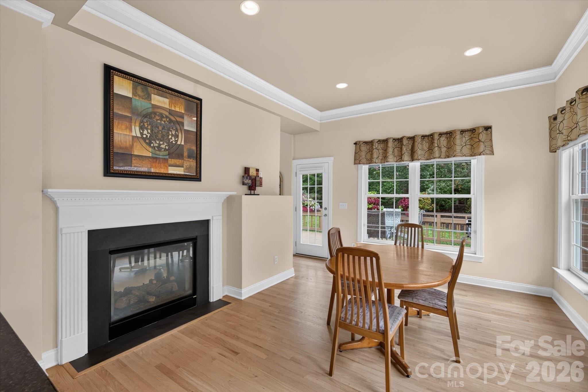Breakfast nook with fireplace - 8306 Denholme Drive, Waxhaw