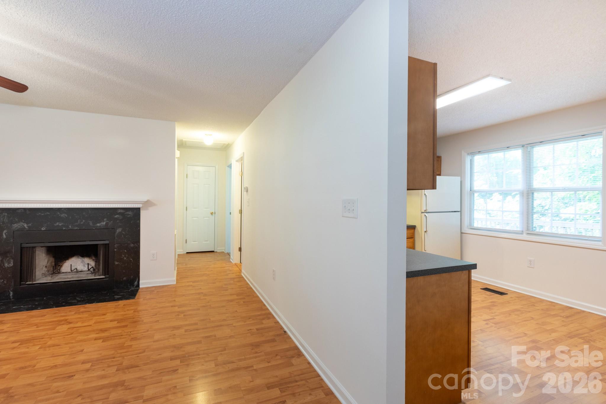 Living Room into kitchen - 820 SE Clearview Court SE, Concord