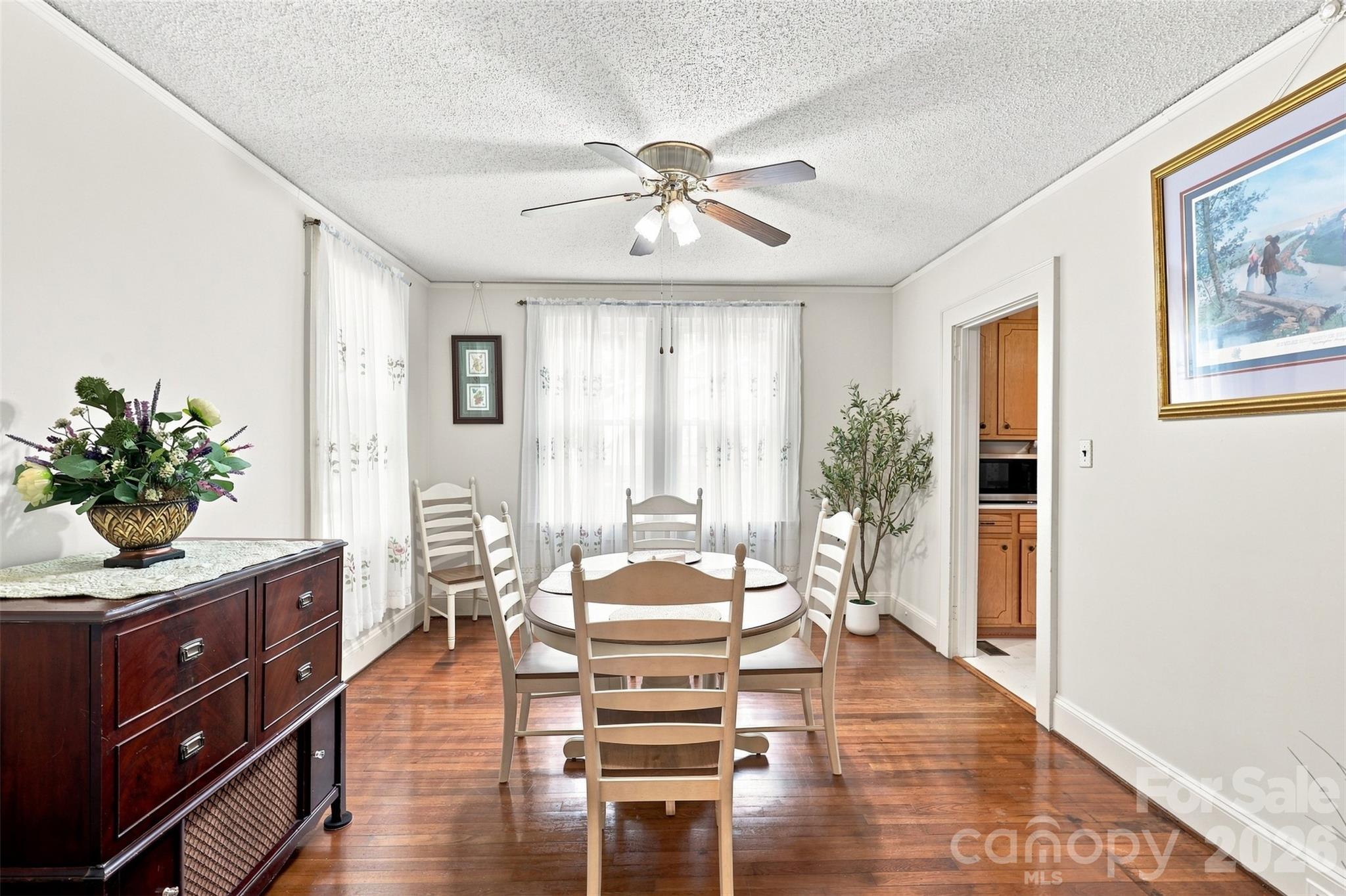 Notice the intentional period accents of hanging picture cleats. This slight drop in trim gives a place to hang pictures without damaging your walls. - 1106 N Main Street, Mount Holly