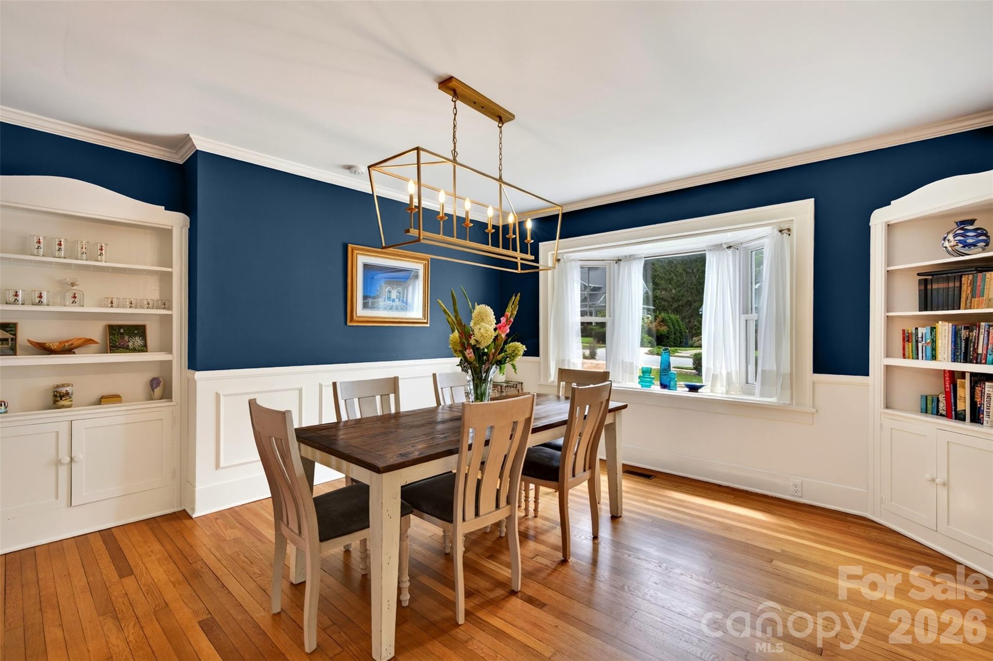 Dining area facing front of house with built ins - 55 Edgemont Road, Asheville