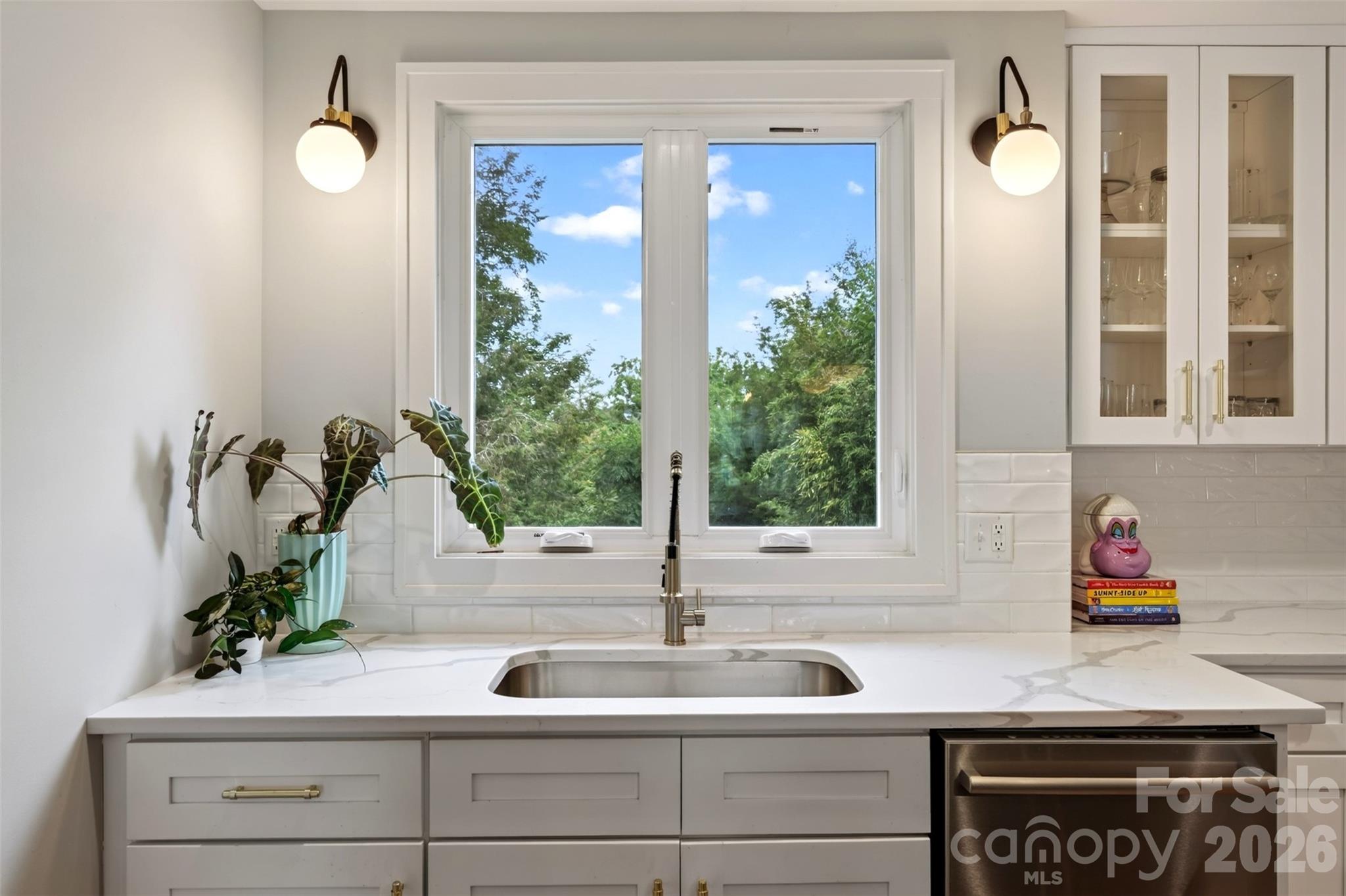 Kitchen sink overlooking terraced back yard - 55 Edgemont Road, Asheville