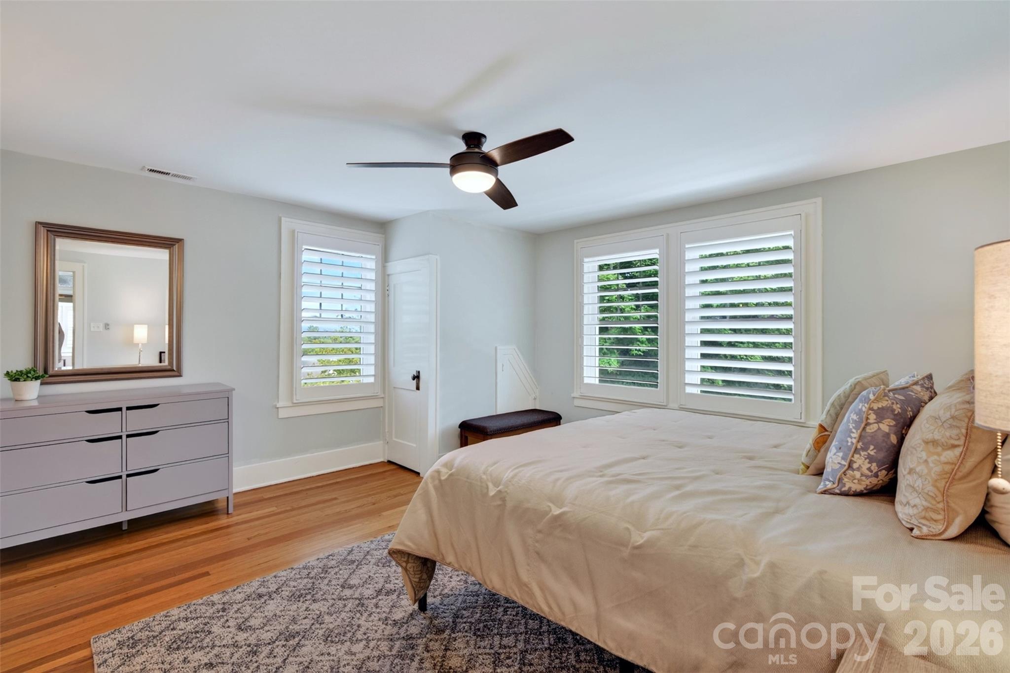 Upper level primary bedroom overlooking back terraced yard - 55 Edgemont Road, Asheville