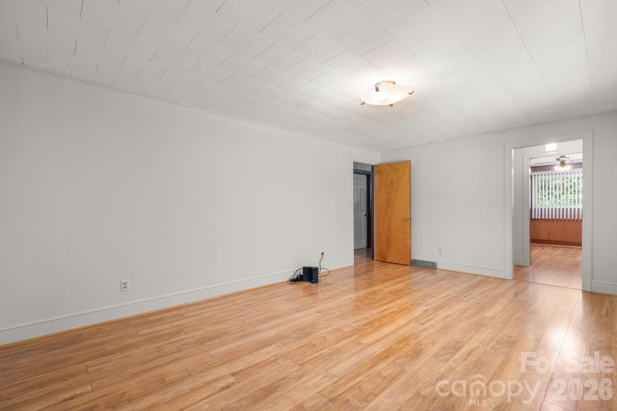 Living Room Is Adjacent To Back Door & Covered Back Deck - 4370 Dynasty Lane, Hudson