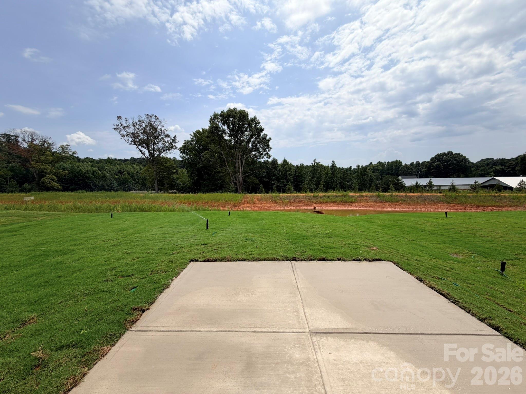 Backyard with Patio - 153 Grouse Run Way, Troutman
