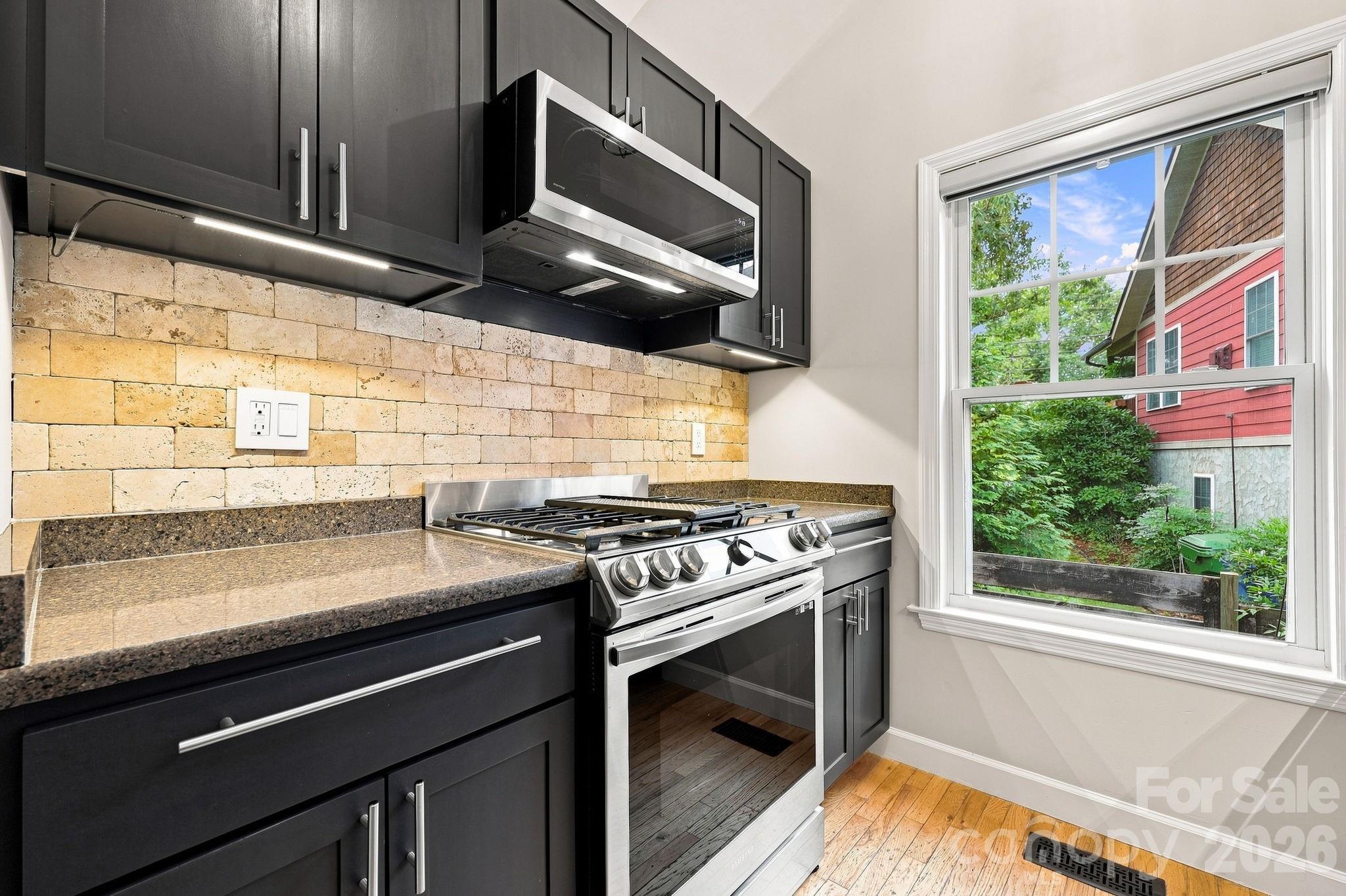 Gas stove/oven and built-in microwave - 146 Courtland Avenue, Asheville