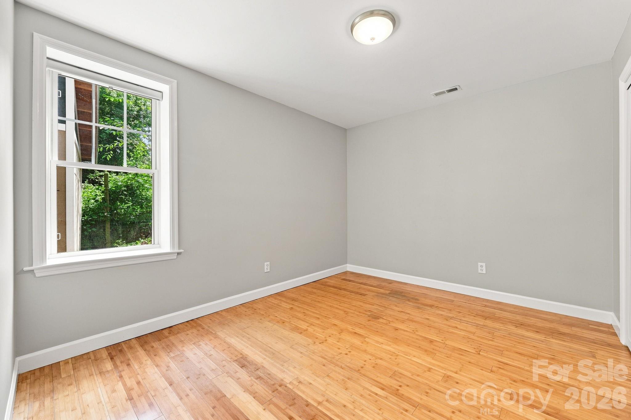 Bedroom featuring abundant natural light. - 146 Courtland Avenue, Asheville