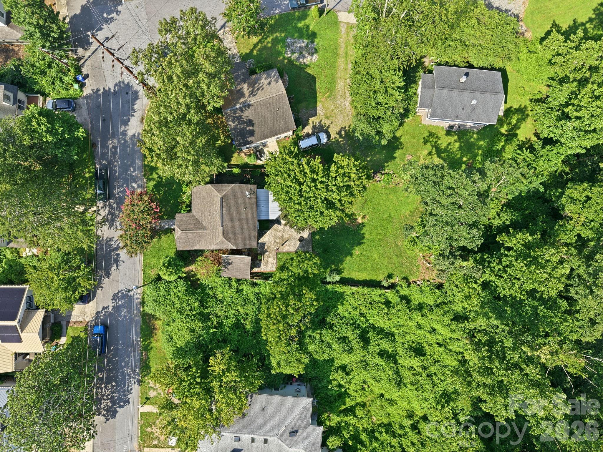 Aerial view of the property showcasing the full lot and surrounding area. - 146 Courtland Avenue, Asheville