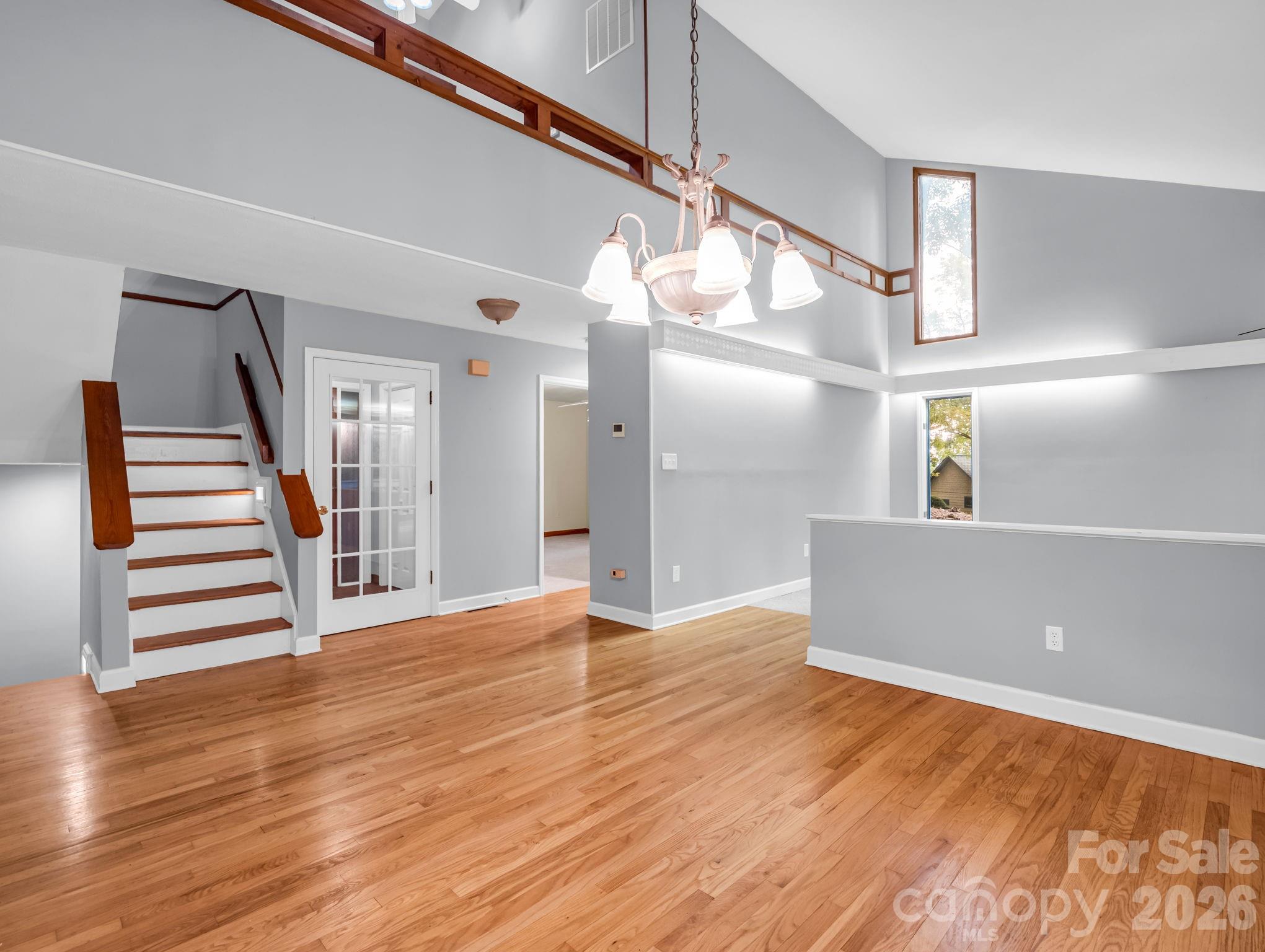 View from Dining Room to Foyer & Stairs - 10 Chestnut Ridge Road, Mills River