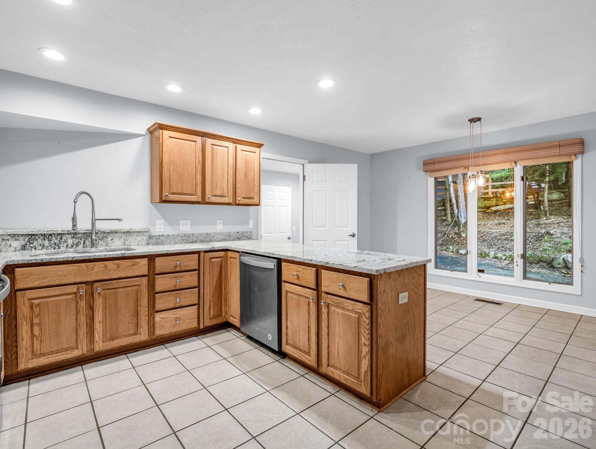 Enter Kitchen from Dining Room, view towards Breakfast & door to Laundry - 10 Chestnut Ridge Road, Mills River