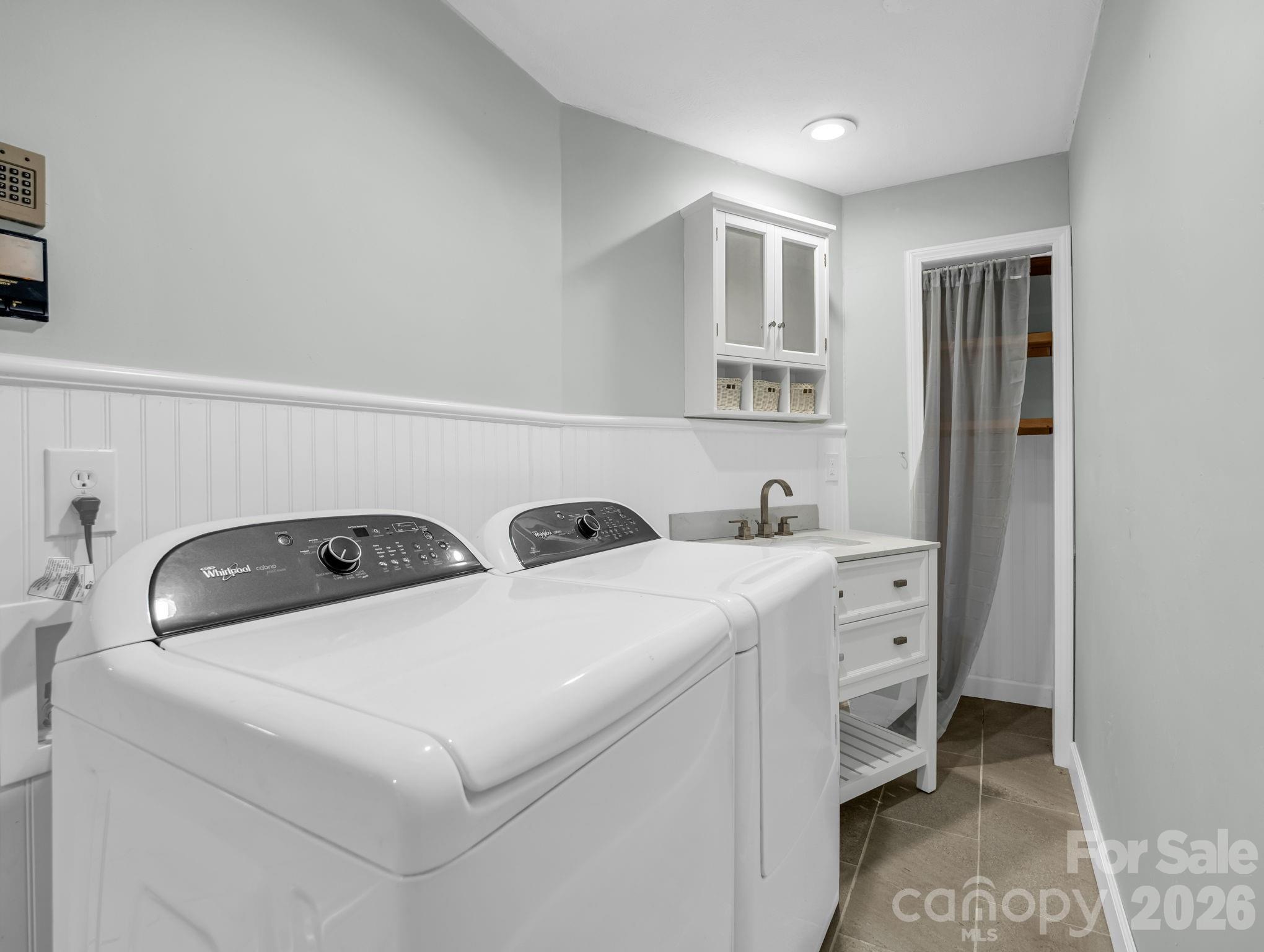 MAIN LEVEL Laundry/Mudroom, situated between Garage & Kitchen - 10 Chestnut Ridge Road, Mills River