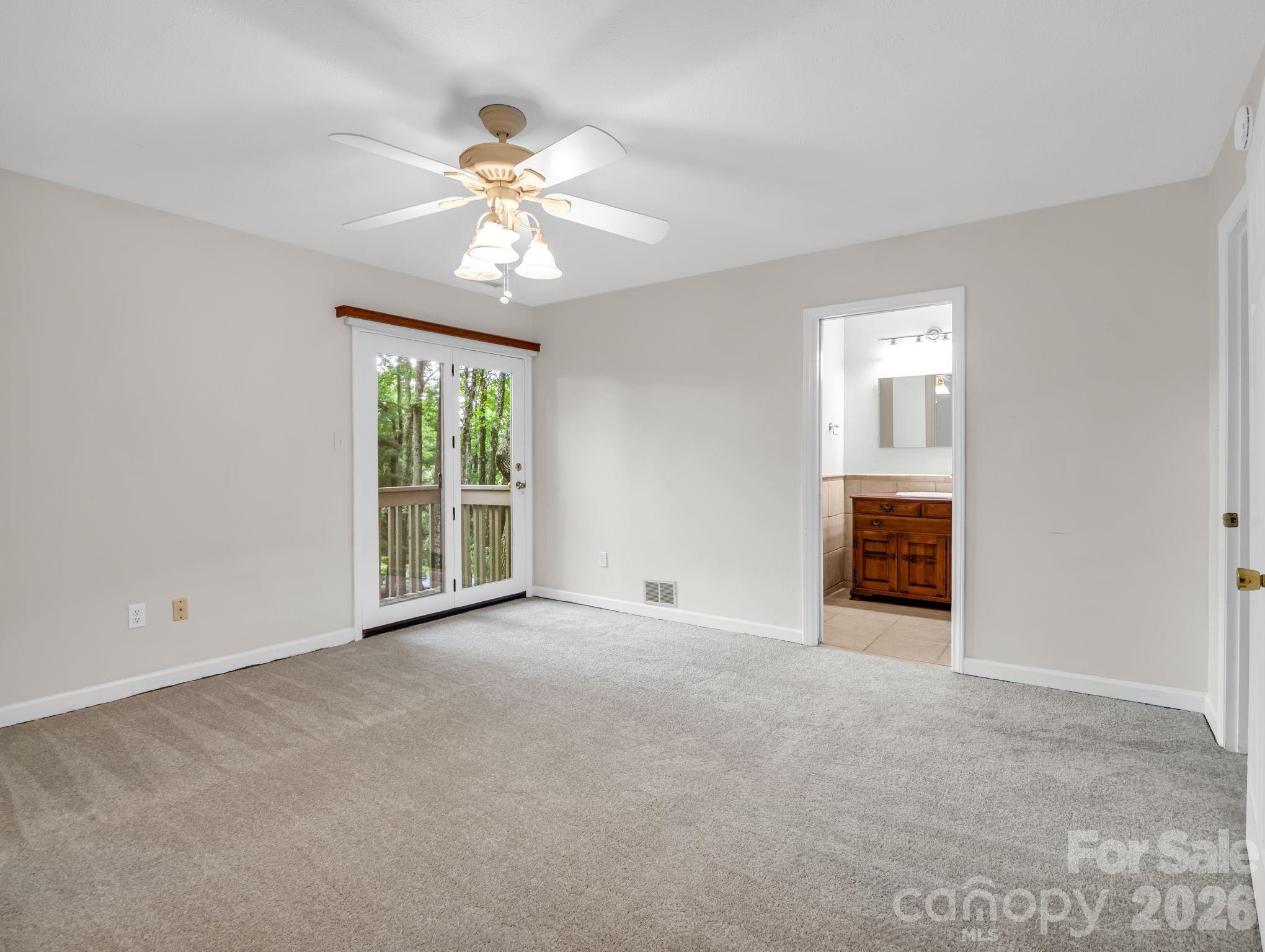 Primary Bedroom with en suite bathroom, large walk-in tile shower - 10 Chestnut Ridge Road, Mills River