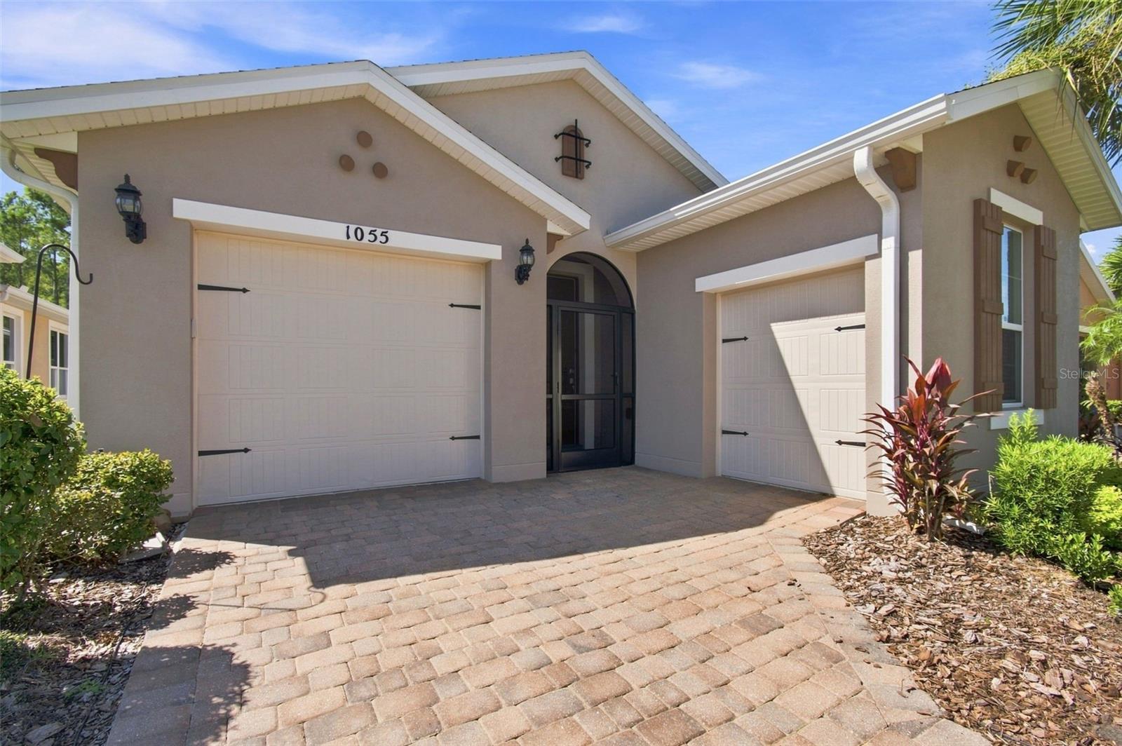 Includes a desired golf cart garage - 1055 HARBOR RIDGE DR, KISSIMMEE