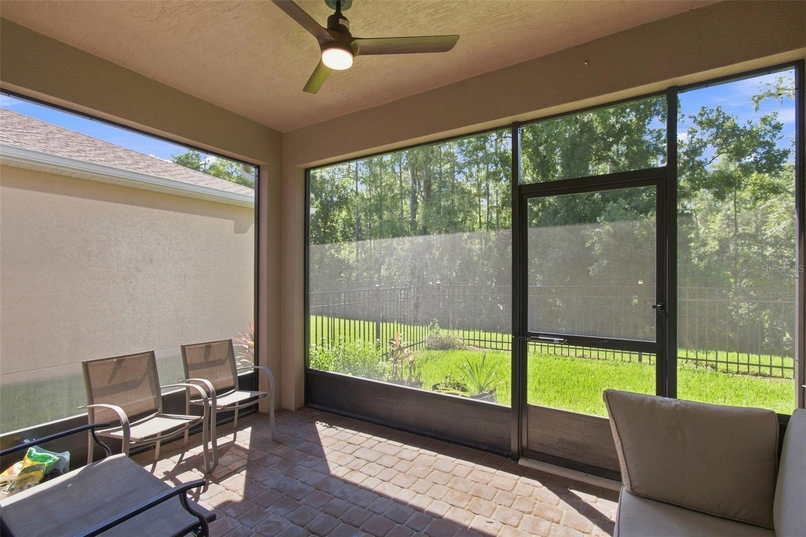 Screened covered lanai - 1055 HARBOR RIDGE DR, KISSIMMEE