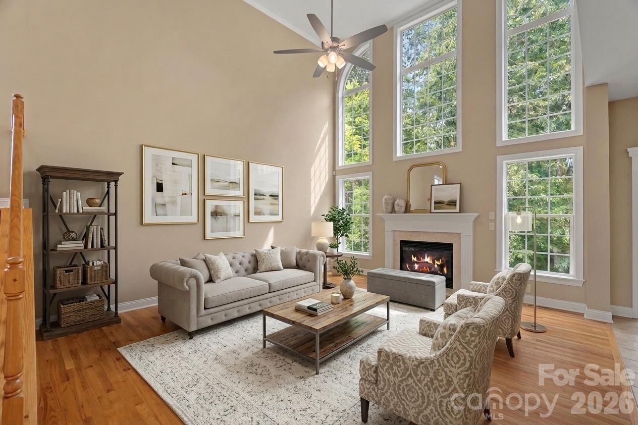 Virtual staging of great room with cathedral ceilings - 9329 Uxbridge Lane, Huntersville