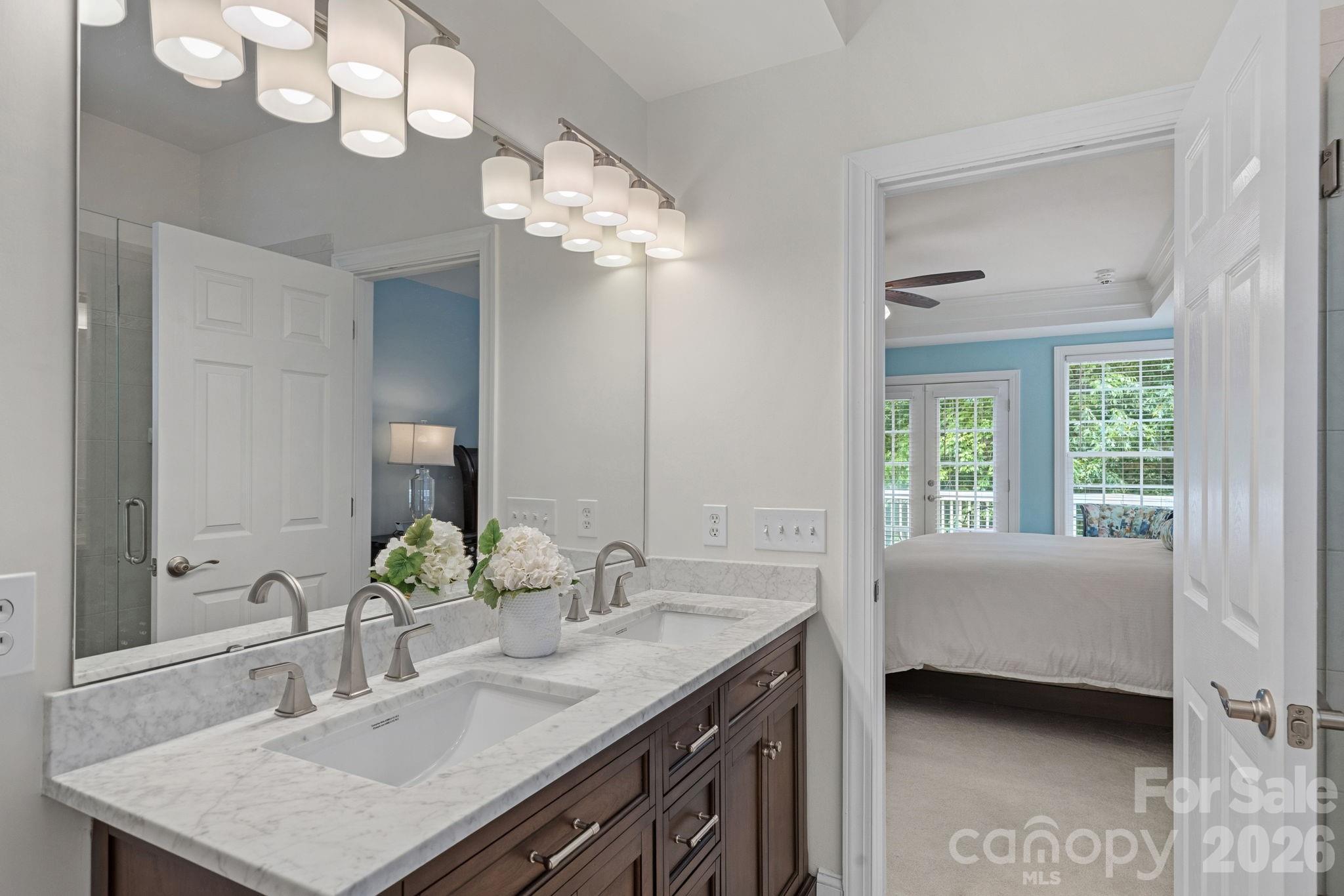 Primary master bath with new vanity and light - 9329 Uxbridge Lane, Huntersville