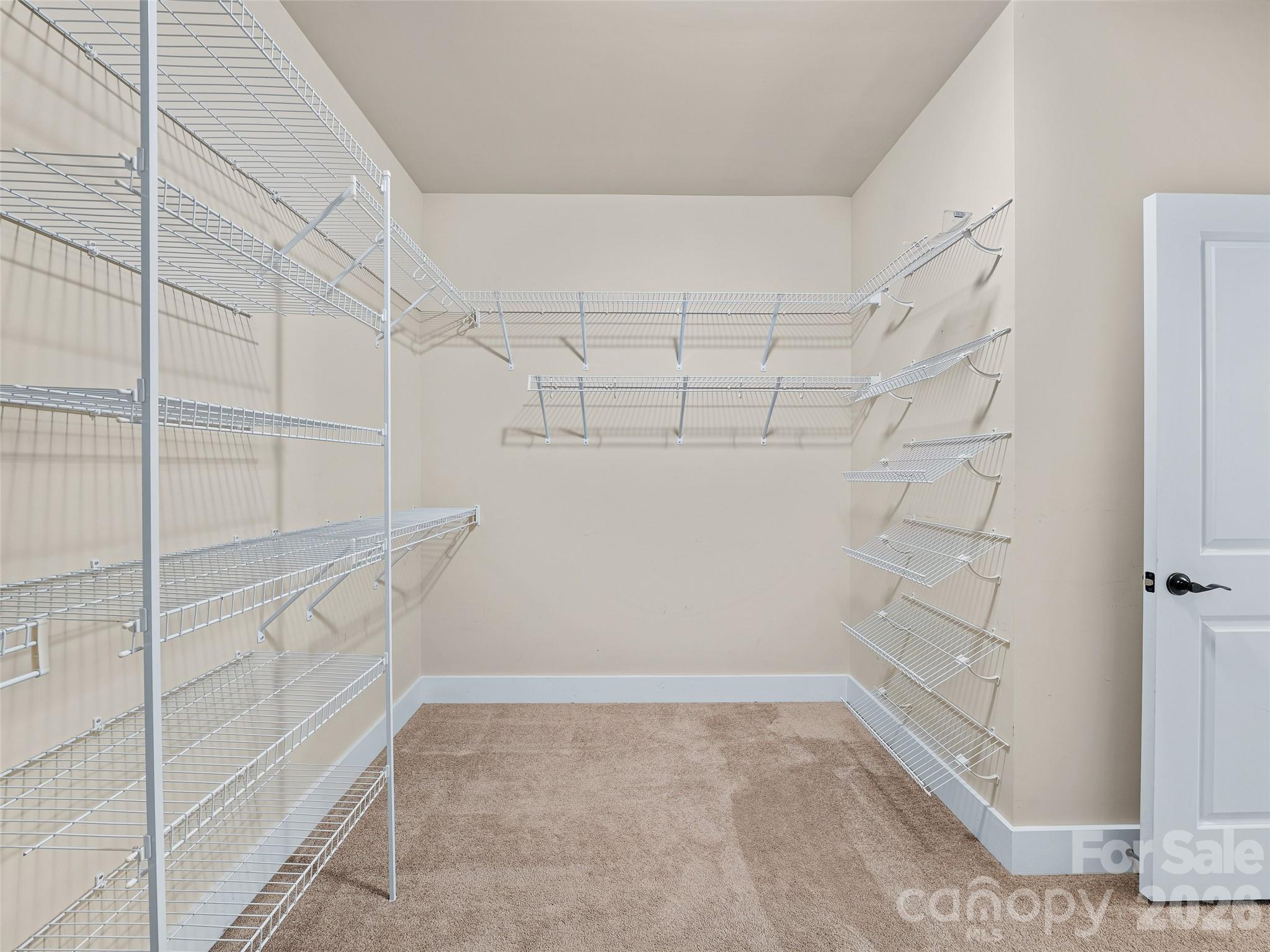 primary walk-in closet - 6 Oak Springs Drive, Arden