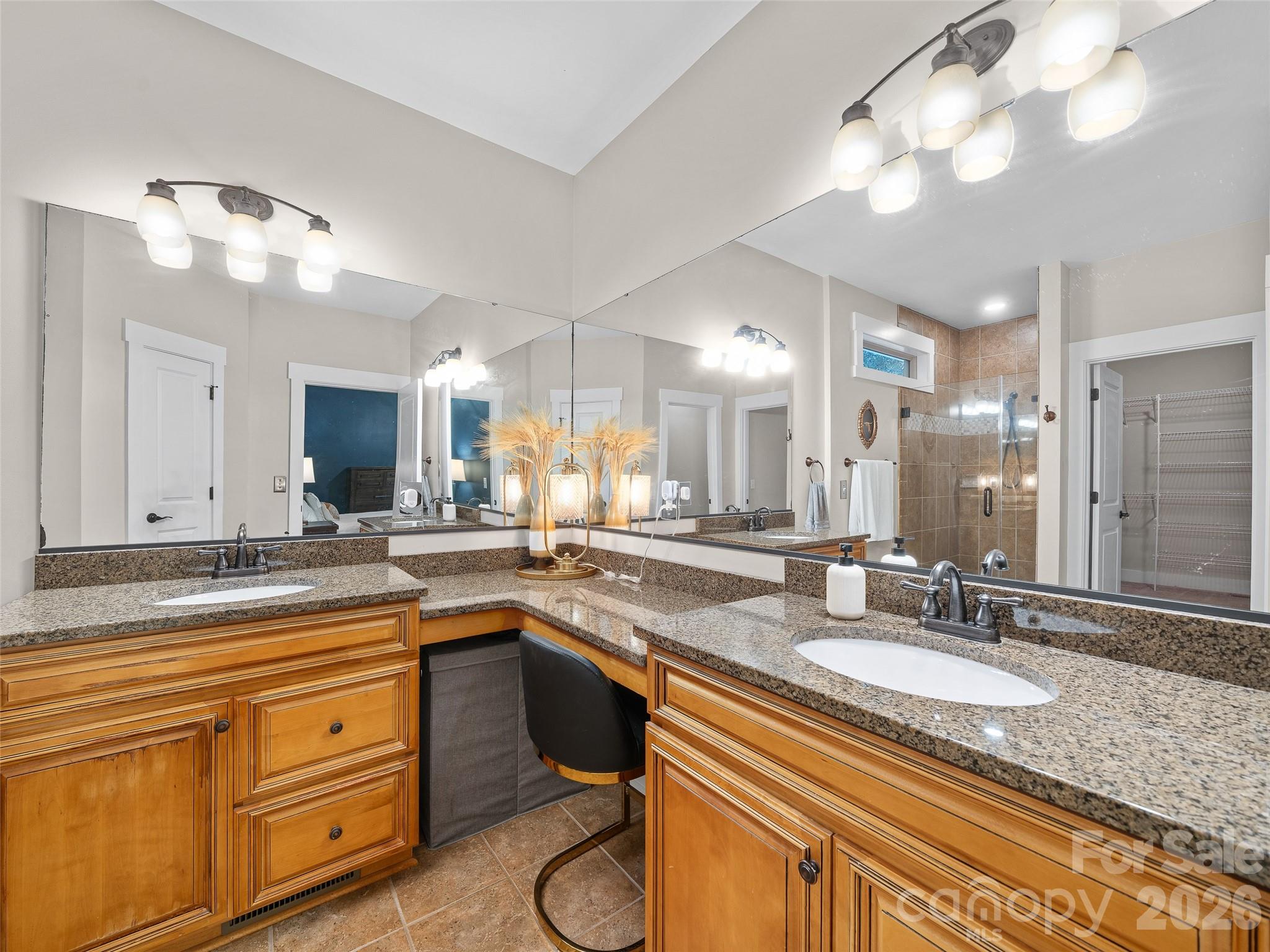spacious primary bathroom with 2 sinks and powder area - 6 Oak Springs Drive, Arden