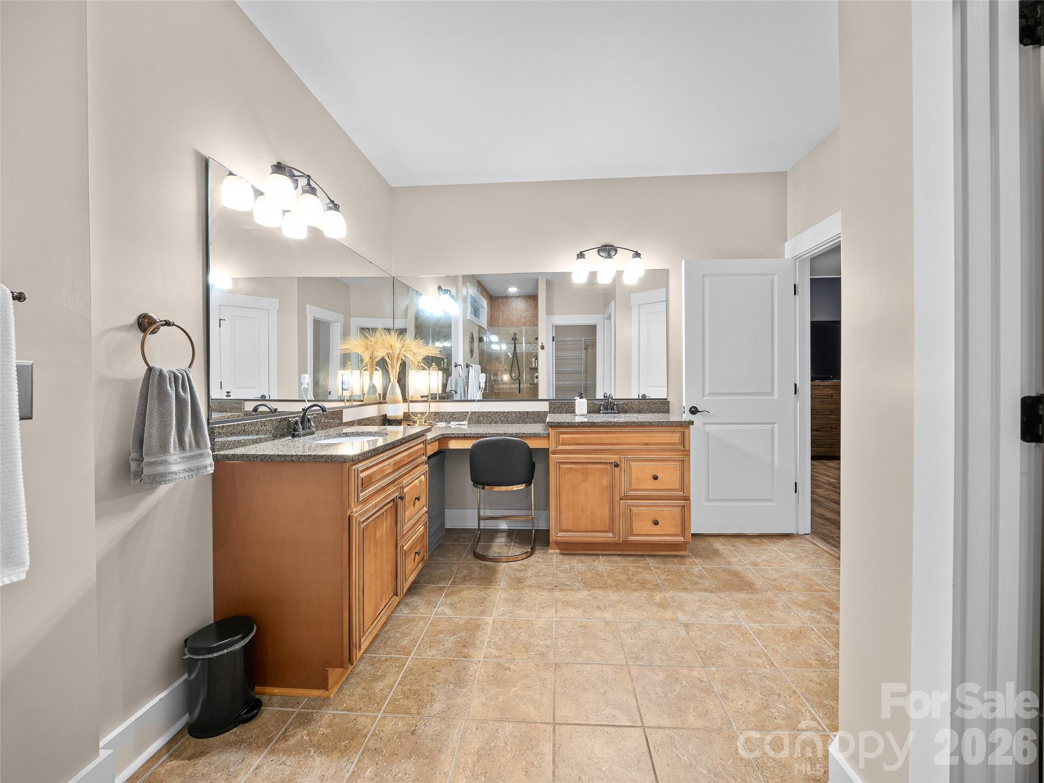 spacious primary bathroom with 2 sinks and powder area - 6 Oak Springs Drive, Arden