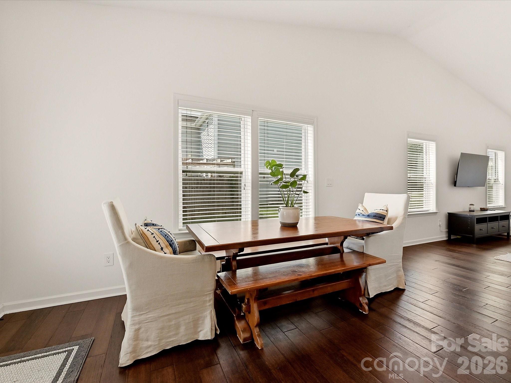 A dining area is illuminated with natural light - 216 Austin Field Court, Mount Holly
