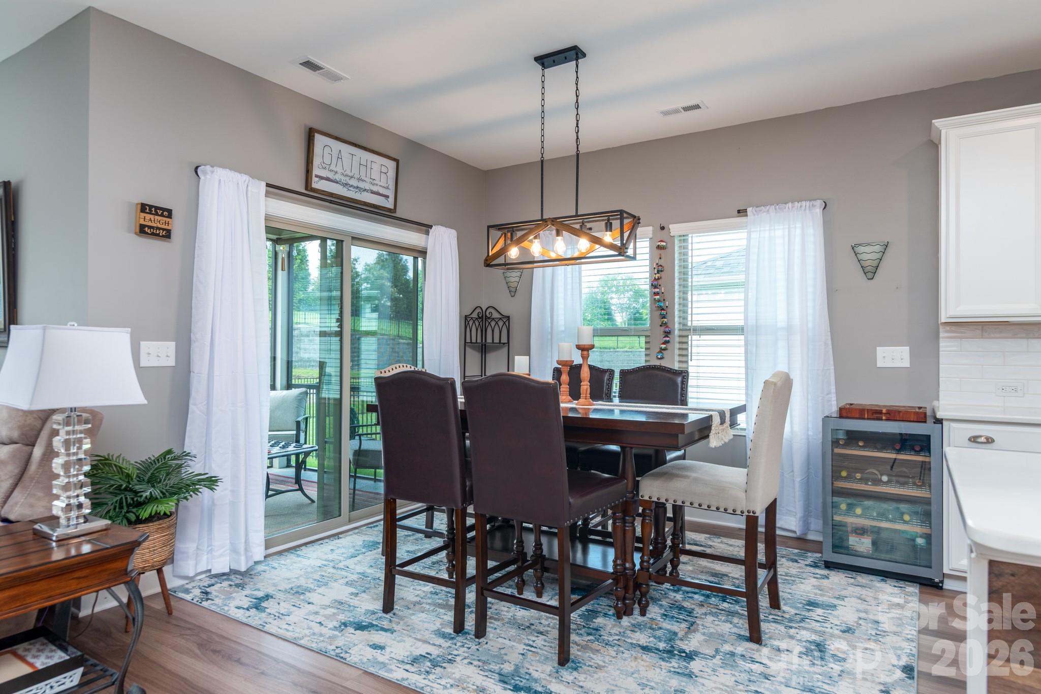 Genrous dining space leads to screened porch - 5134 Turtle Creek Drive, Denver