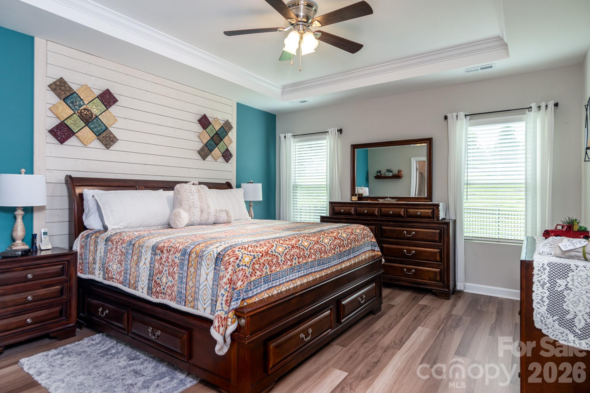 Primary bedroom with LVP floors - 5134 Turtle Creek Drive, Denver
