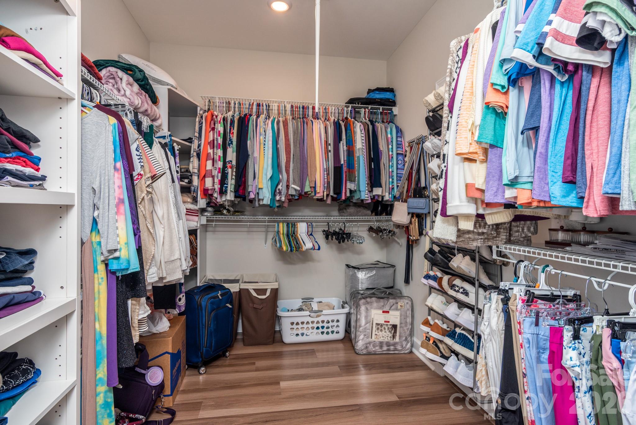 Very large primary bedroom closet - 5134 Turtle Creek Drive, Denver