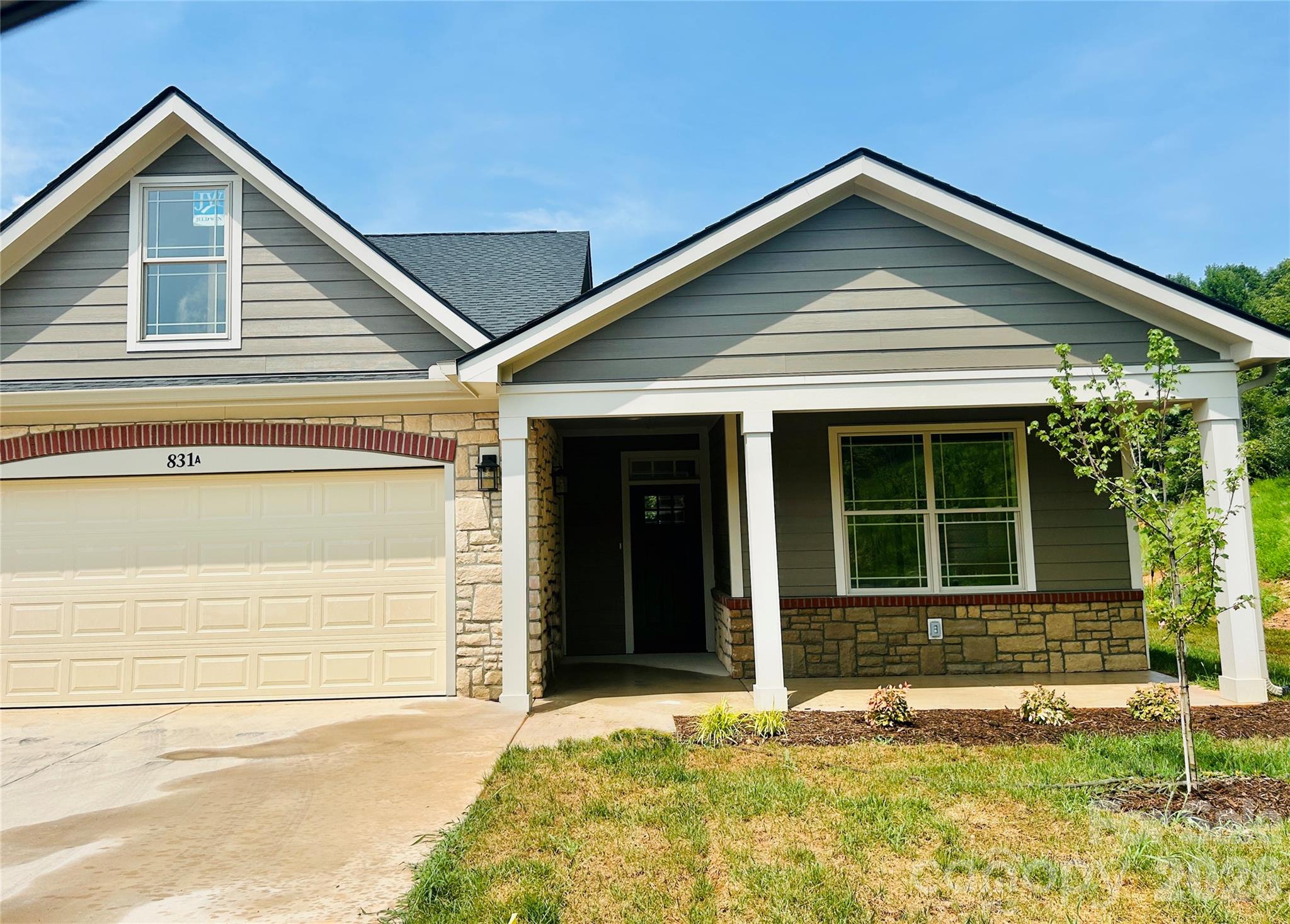 Attached 2 car garage, covered front porch. - 831-A Wynnshire Drive, Hickory