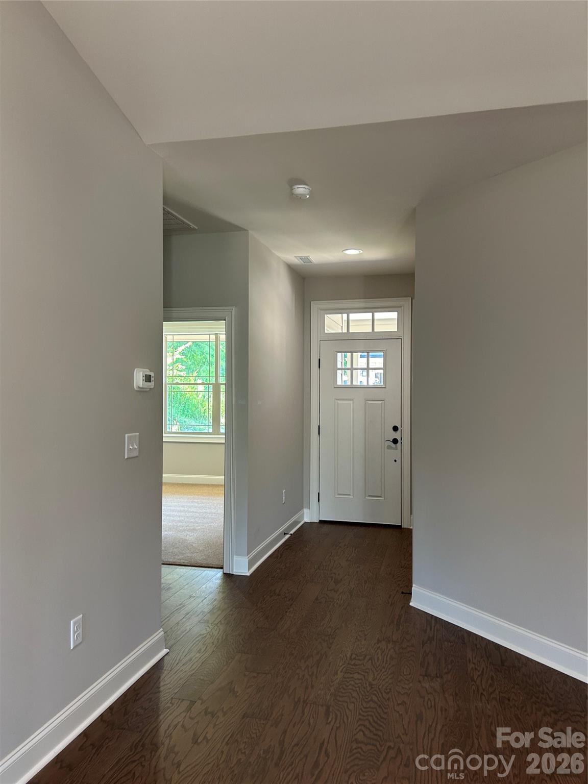 Front door with 2nd bedroom and bath to left. - 831-A Wynnshire Drive, Hickory