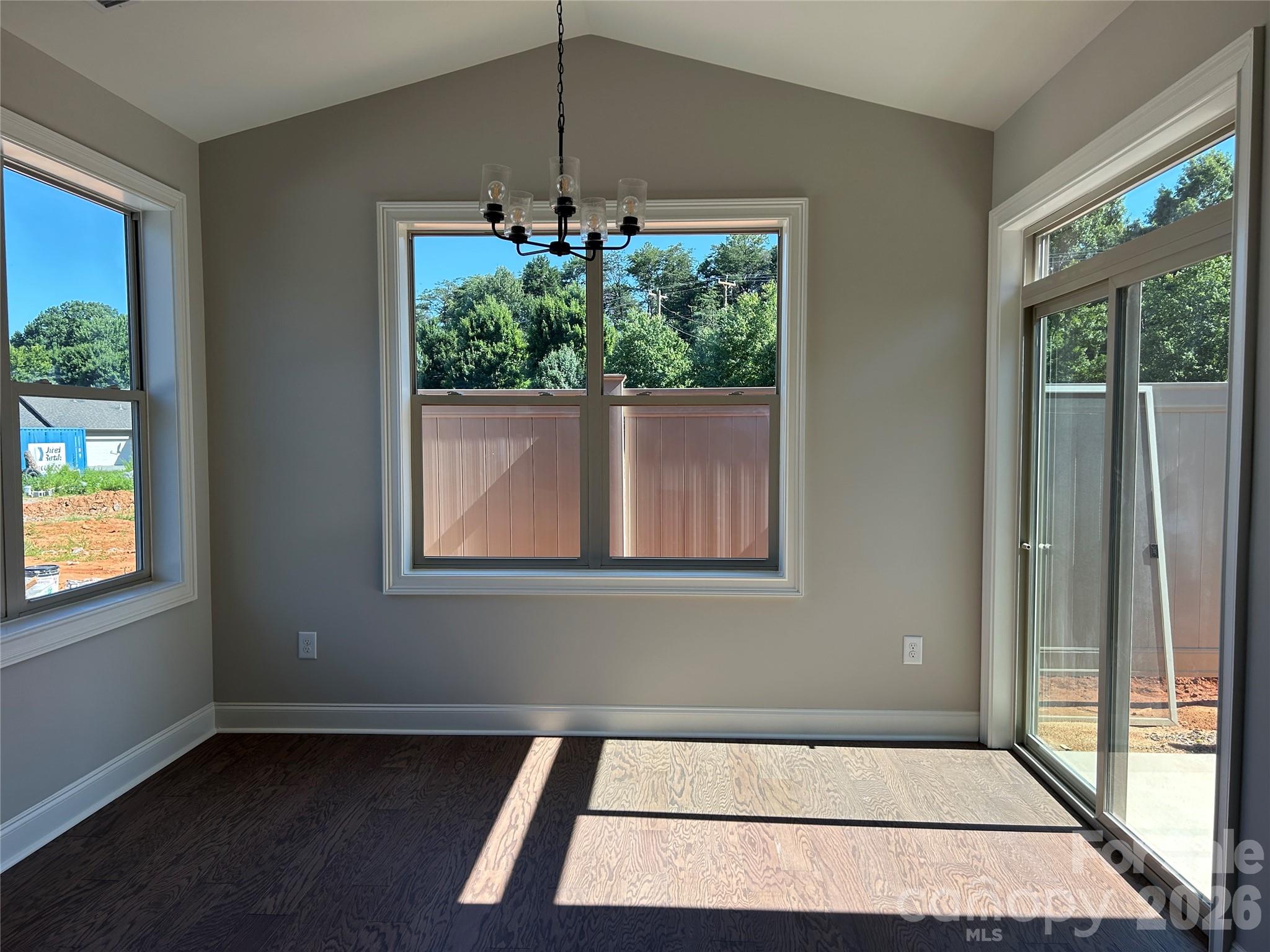 Dining area in kitchen with sliding doors out to patio. - 831-A Wynnshire Drive, Hickory