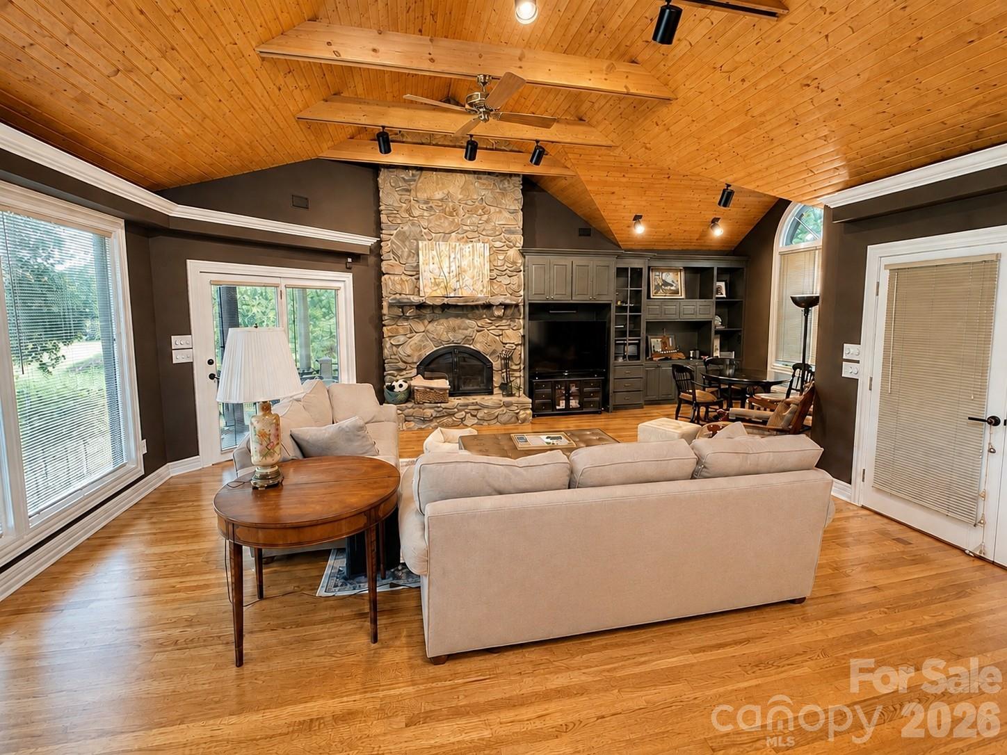 Golf Course view from the den with rock fireplace. - 4821 Elmhurst Drive NE, Hickory