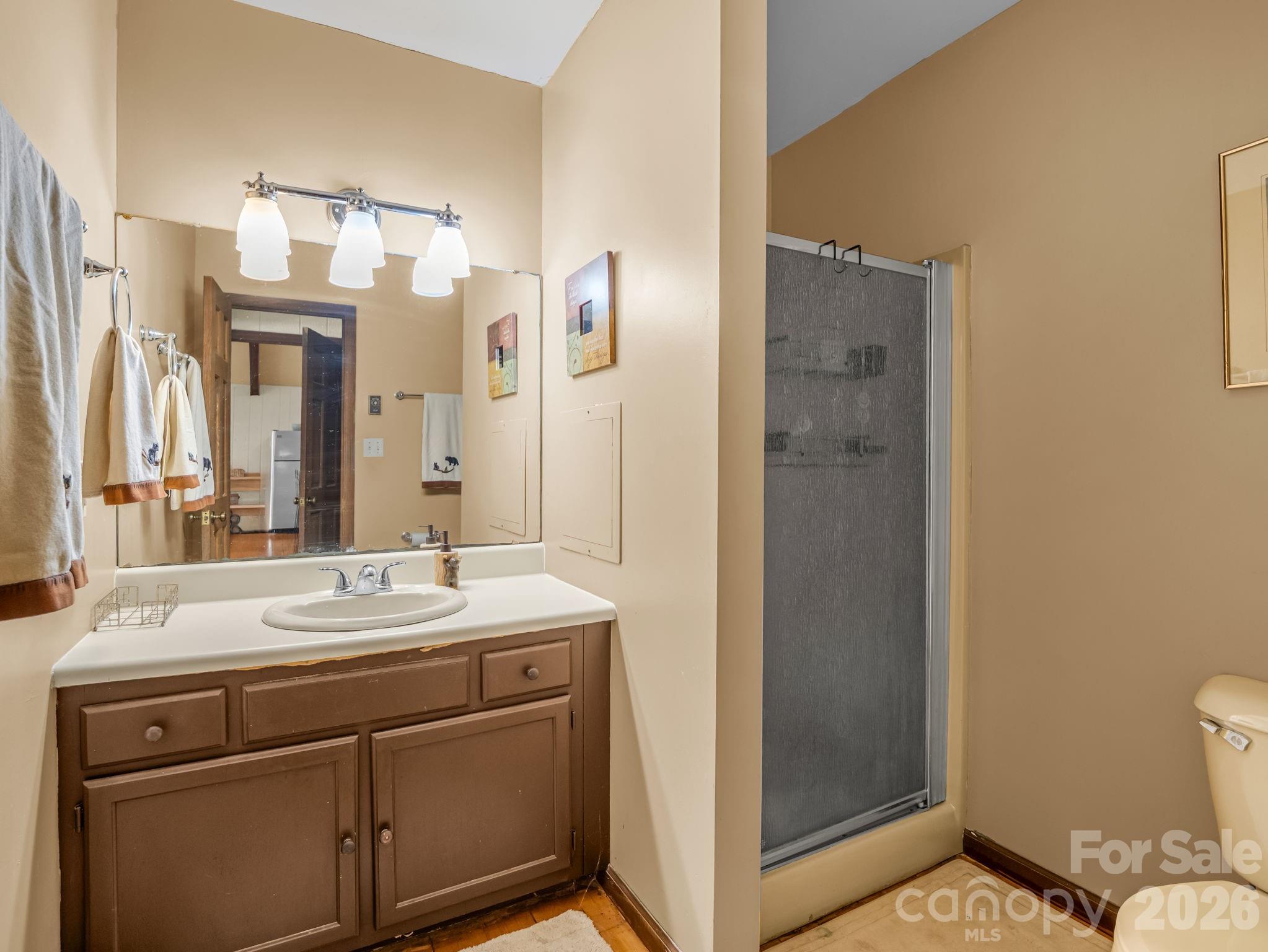 Second ensuite on main level/top floor - opens to the main living area - 179 Sarvis Lane, Mars Hill