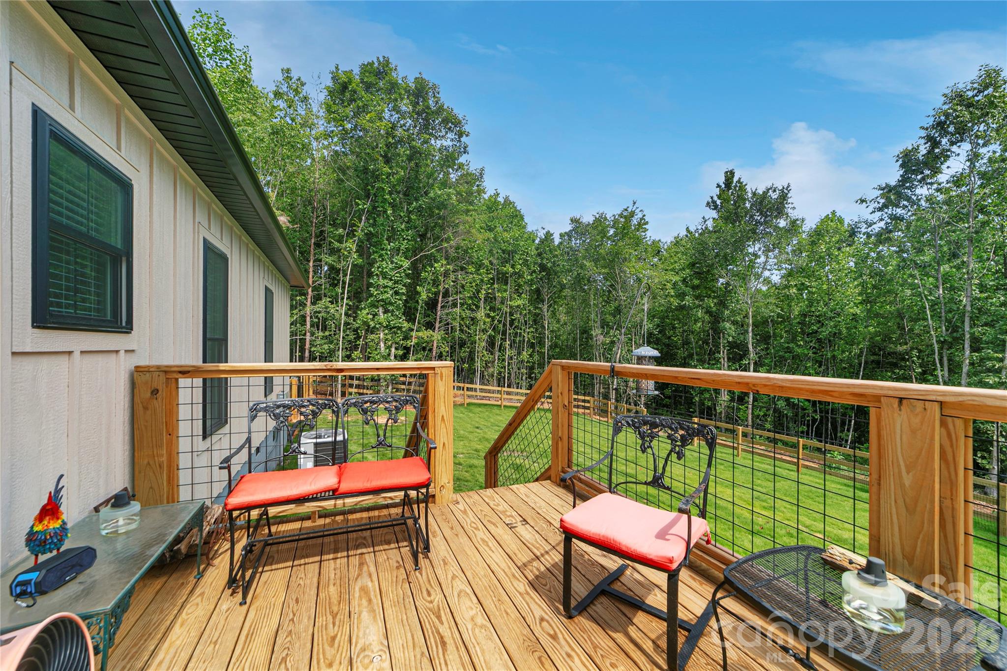 Brand new rear deck and new canine ready fenced area.! Back yard surrounded by beautiful trees on the left side of the house.! - 98 Lexxi Lane, Tryon
