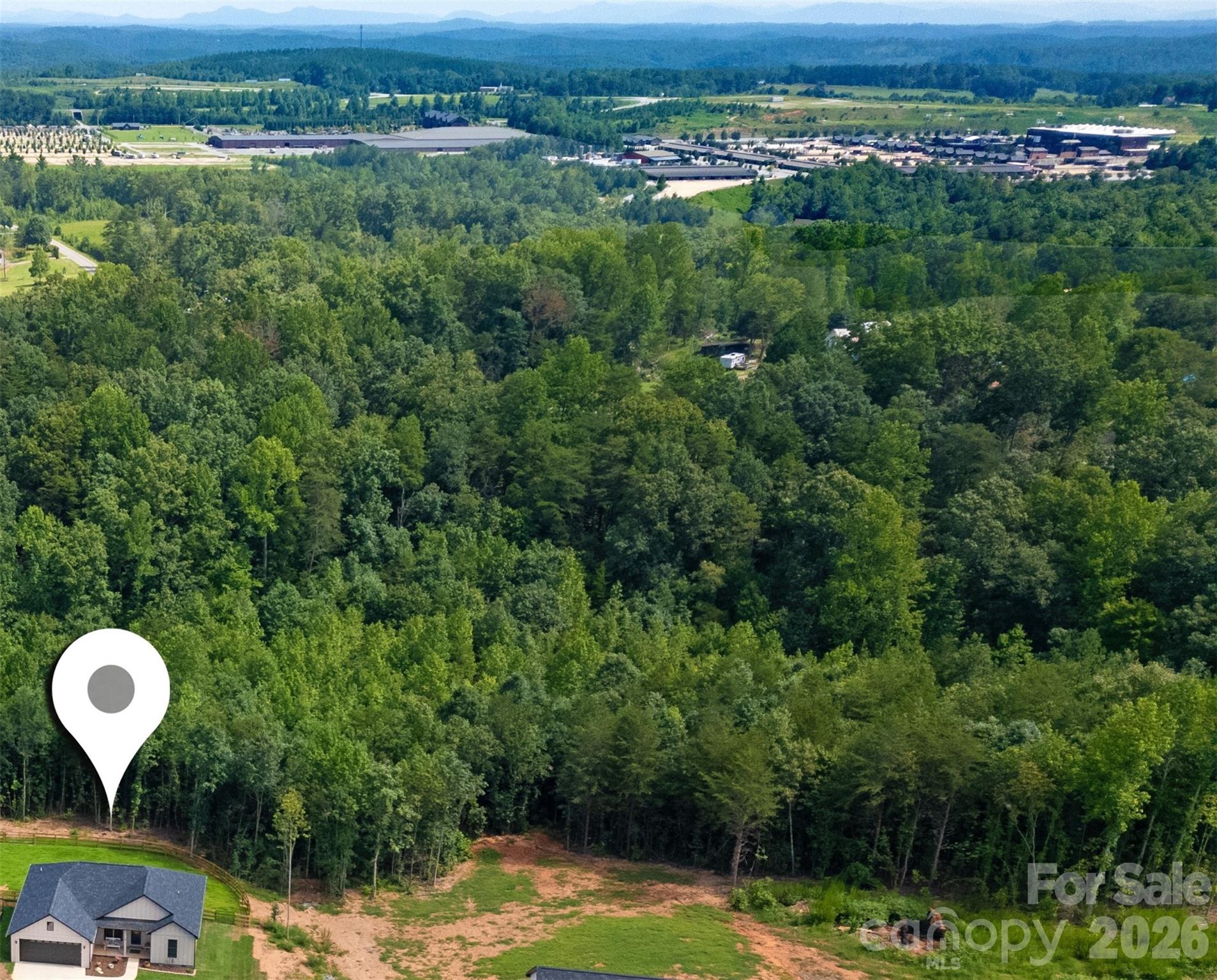 House in the bottom left corner. The Green River flows in the trees about a half mile away. Just beyond, is the Tryon International Equestrian Center (TIEC). Bring your kayaks and horses.! - 98 Lexxi Lane, Tryon