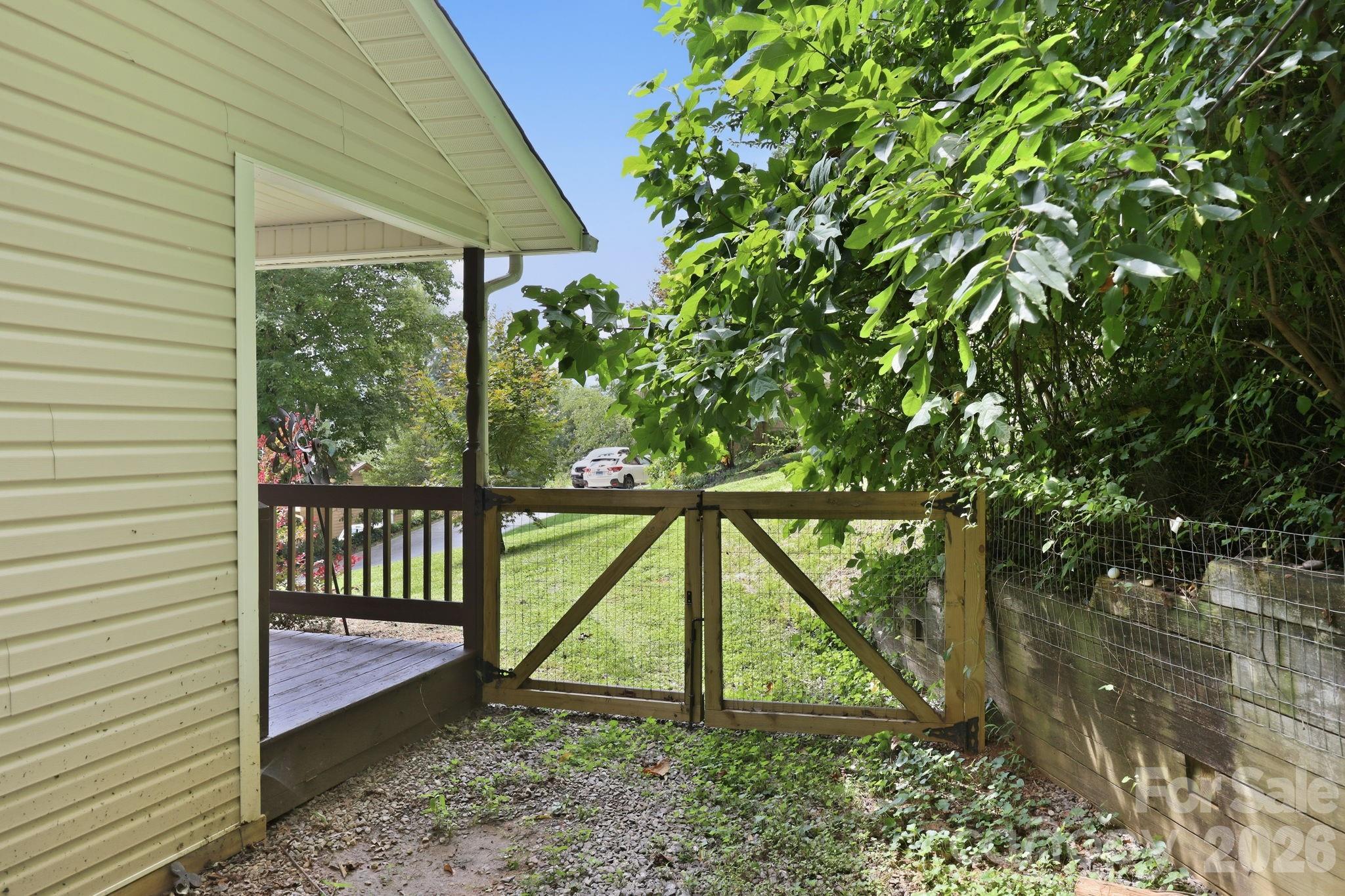 Fenced yard accessible from front porch - 16 Westwood Drive, Candler