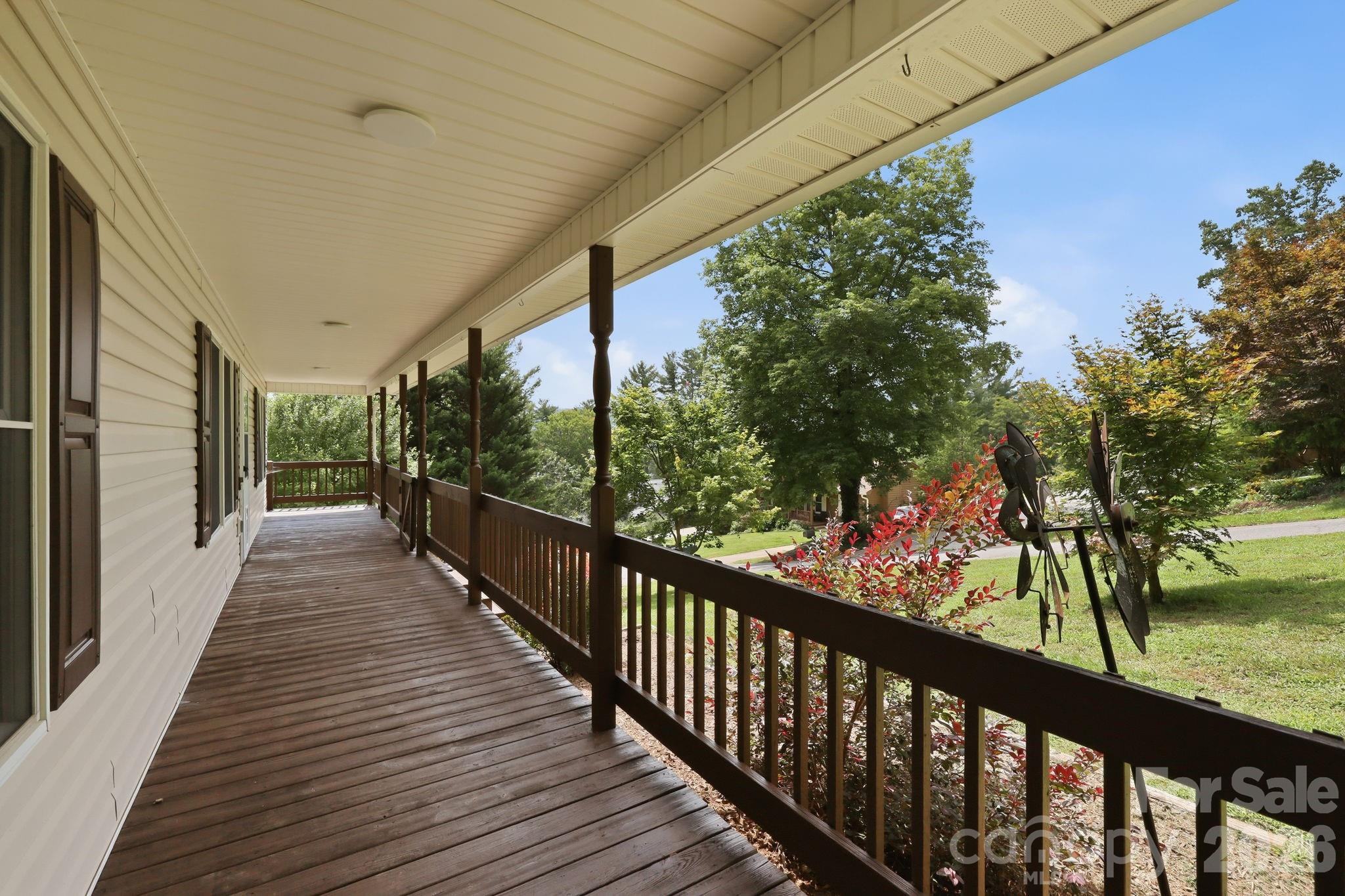 Large, Covered Front Porch leads to fenced side and back yard - 16 Westwood Drive, Candler