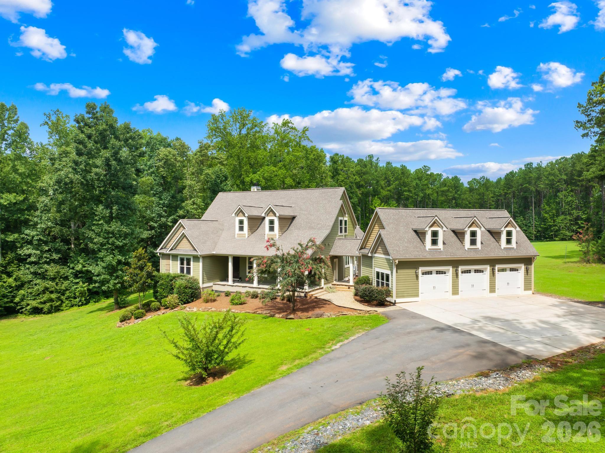Front view of home showcasing the three car garage - 6334 Long Island Road, Catawba