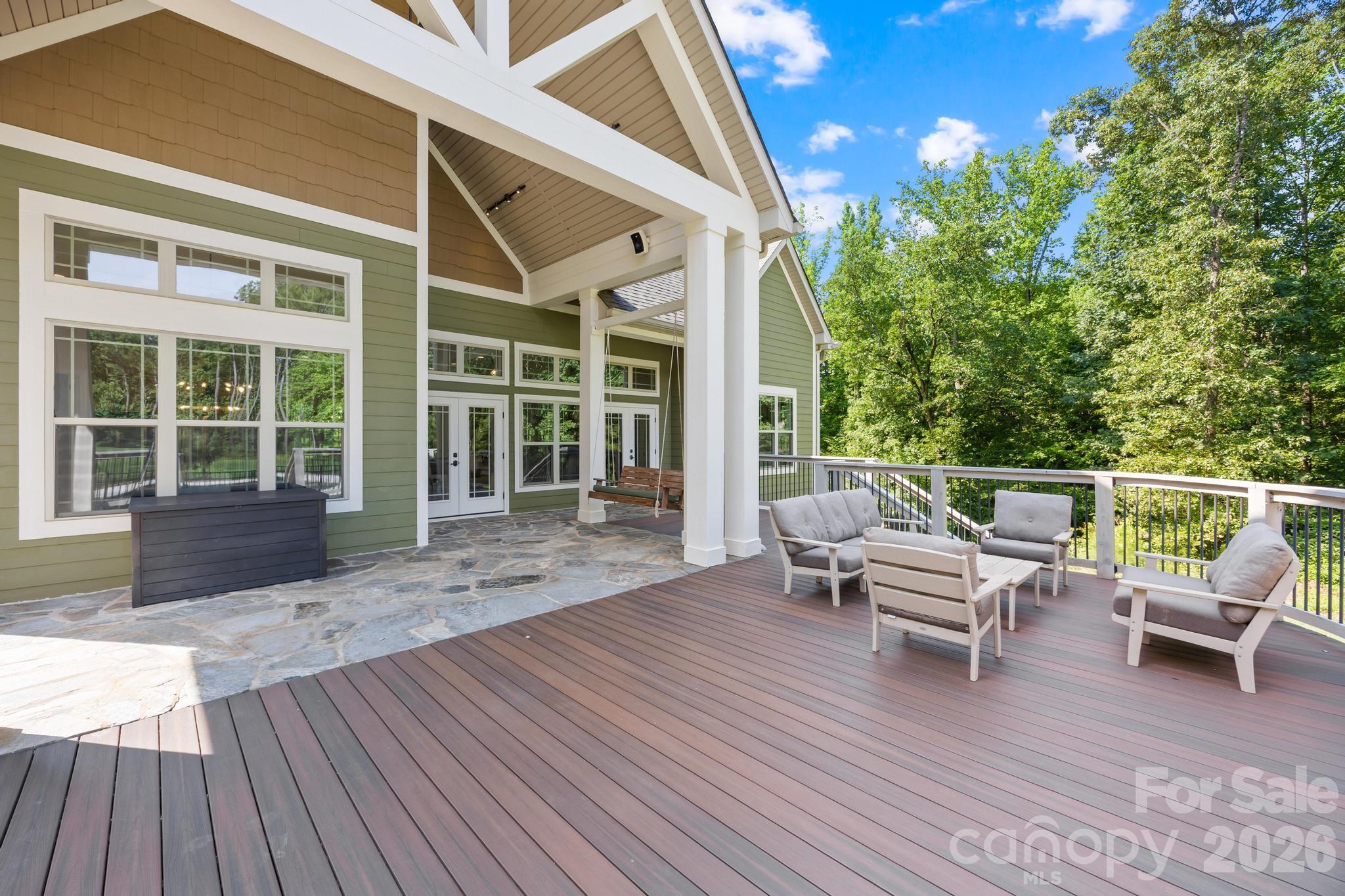 Stone and trex decking, swing, and outdoor speakers - 6334 Long Island Road, Catawba