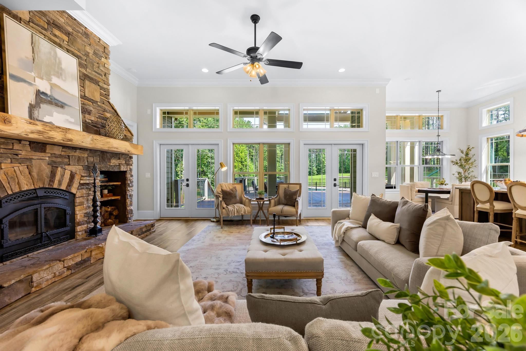 Wood burning fireplace with blower, set of doors leading to back patio/pool area - 6334 Long Island Road, Catawba