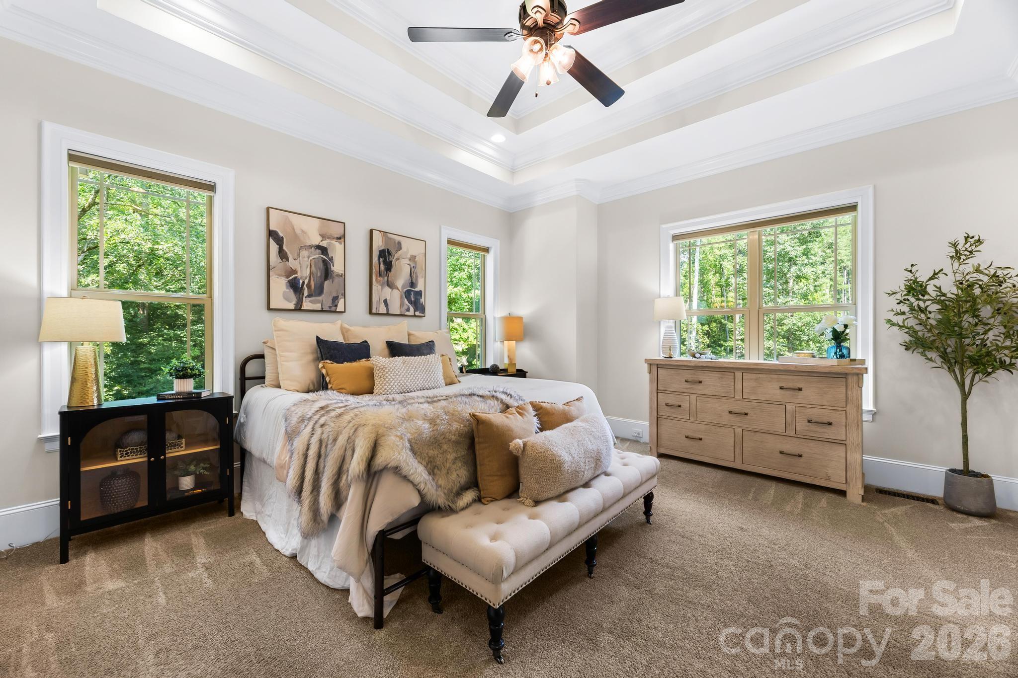 Primary bedroom off living room with tray ceilings - 6334 Long Island Road, Catawba