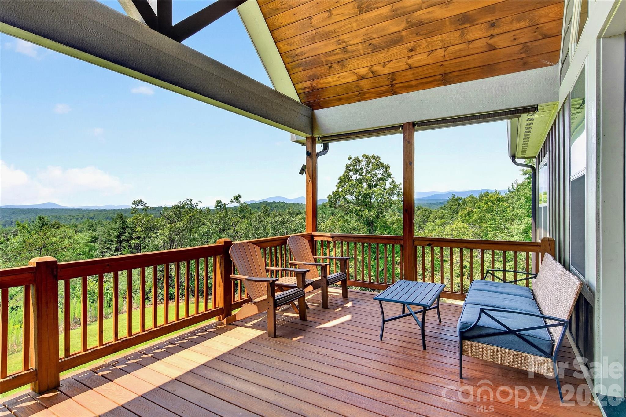 Porch seating built for the view; covered for all seasons - 207 Lake Crest Drive, Nebo