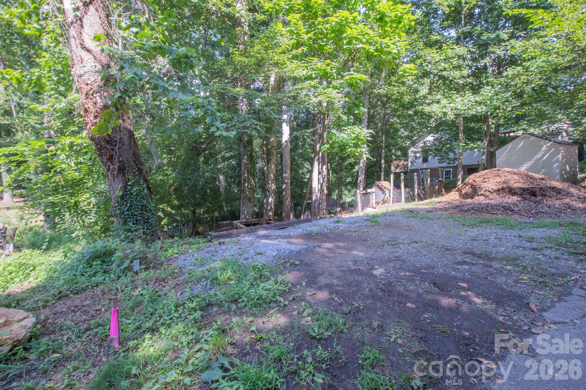 Leveled parking area. Approximate corners are marked. - 99999 Rumbough Place, Asheville