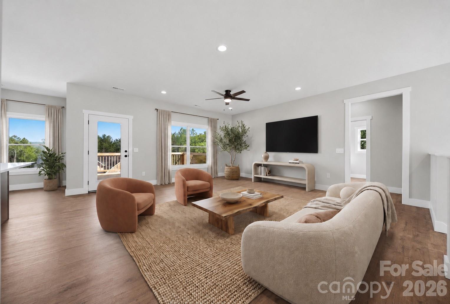 Spacious living areas. Views of the mountains. Virtually stages living room. - 426 Huntington Woods Street SE, Lenoir