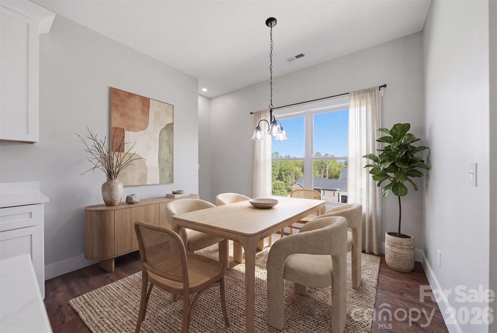 Dining area has views! Virtually staged picture. - 426 Huntington Woods Street SE, Lenoir