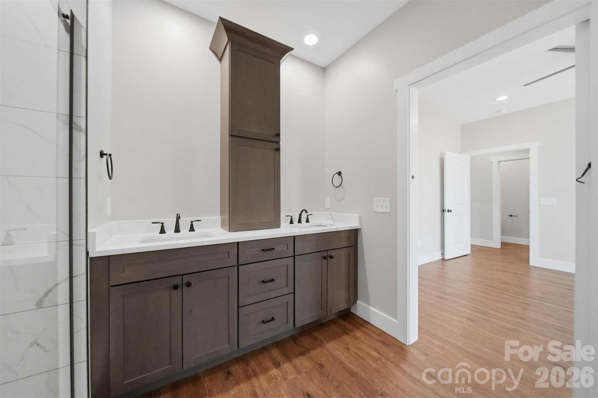 Beautiful primary bathroom with custom cabinetry! - 426 Huntington Woods Street SE, Lenoir