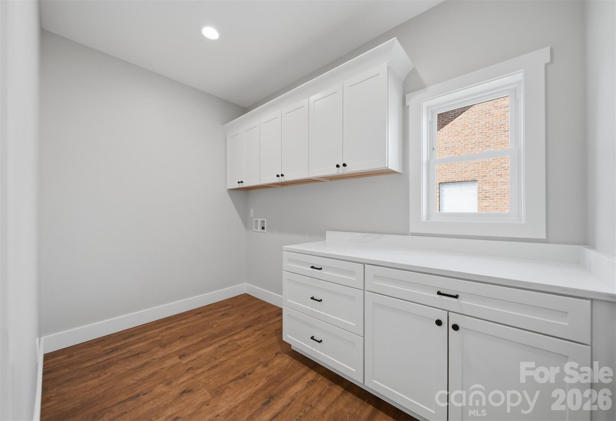Large laundry room with custom cabinetry! - 426 Huntington Woods Street SE, Lenoir