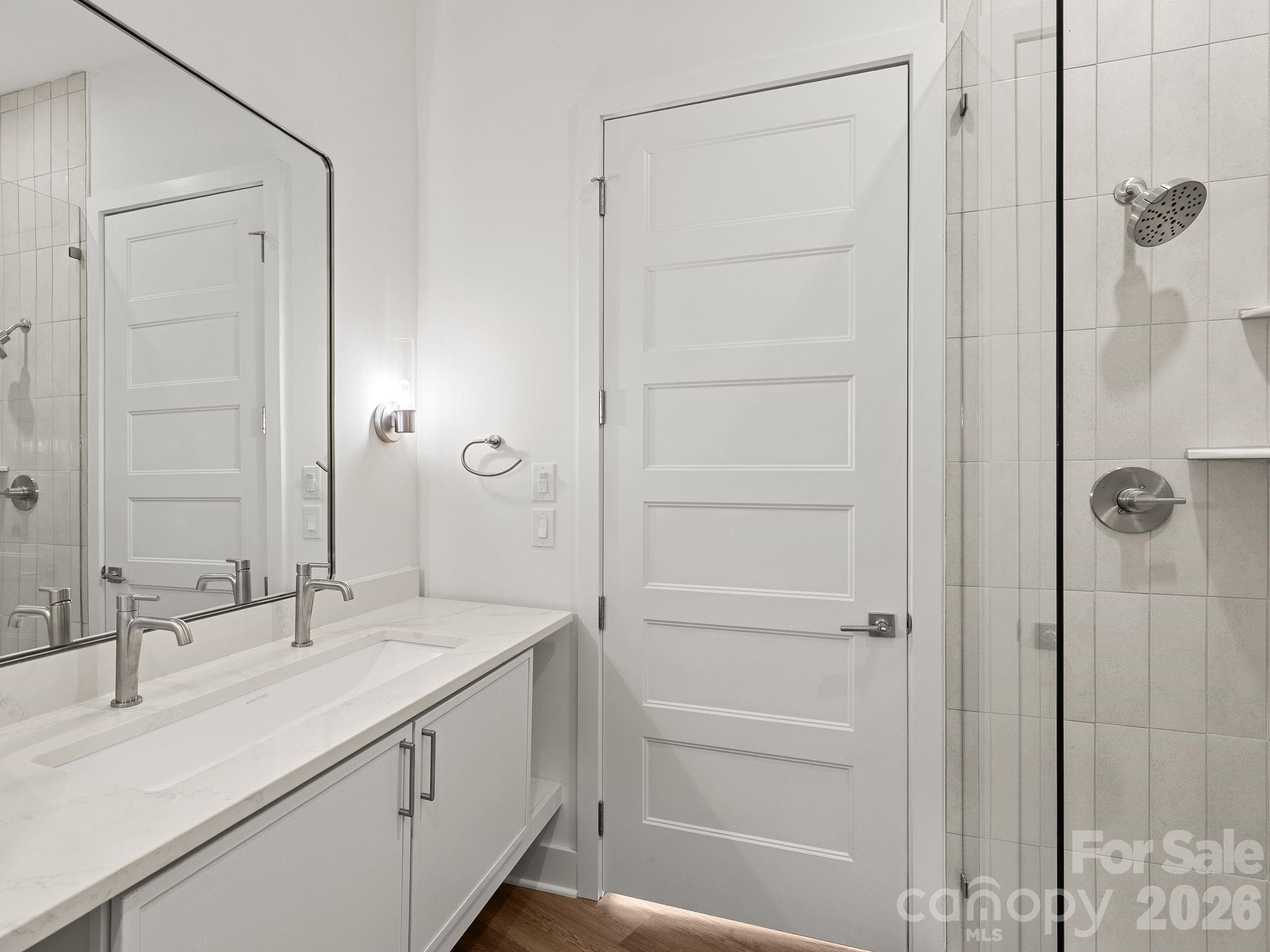 Representative photo. tile in shower is actually black - 123 Haywood Street, Asheville