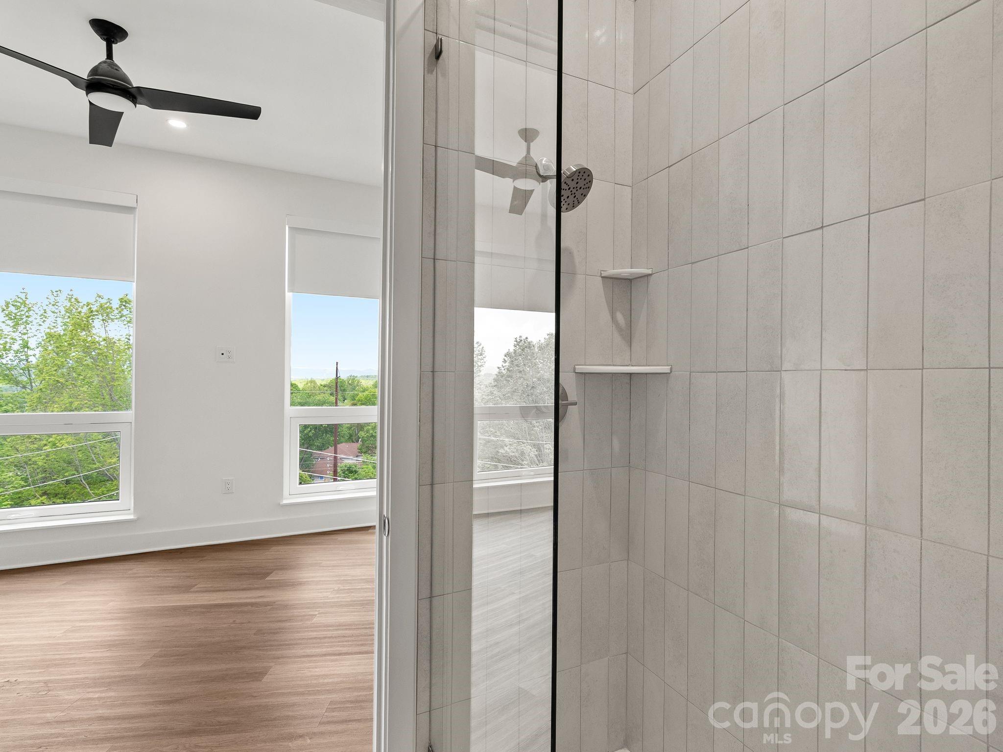Representative photo. tile in shower is actually black - 123 Haywood Street, Asheville