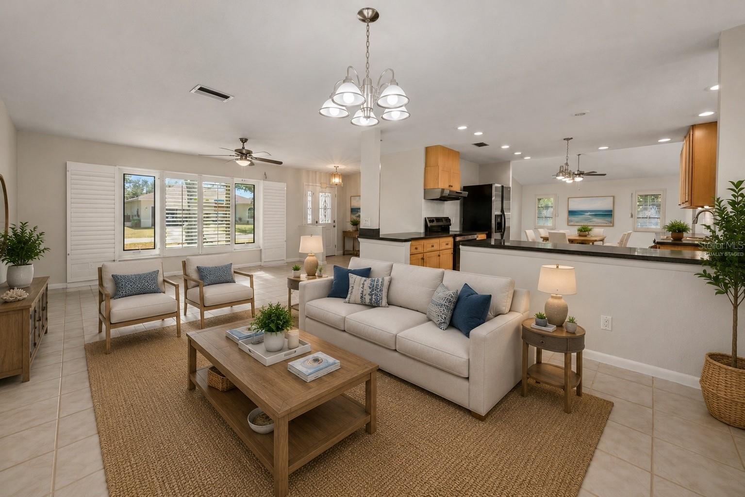 Virtually staged living room - 17356 GULFSPRAY CIR, PORT CHARLOTTE