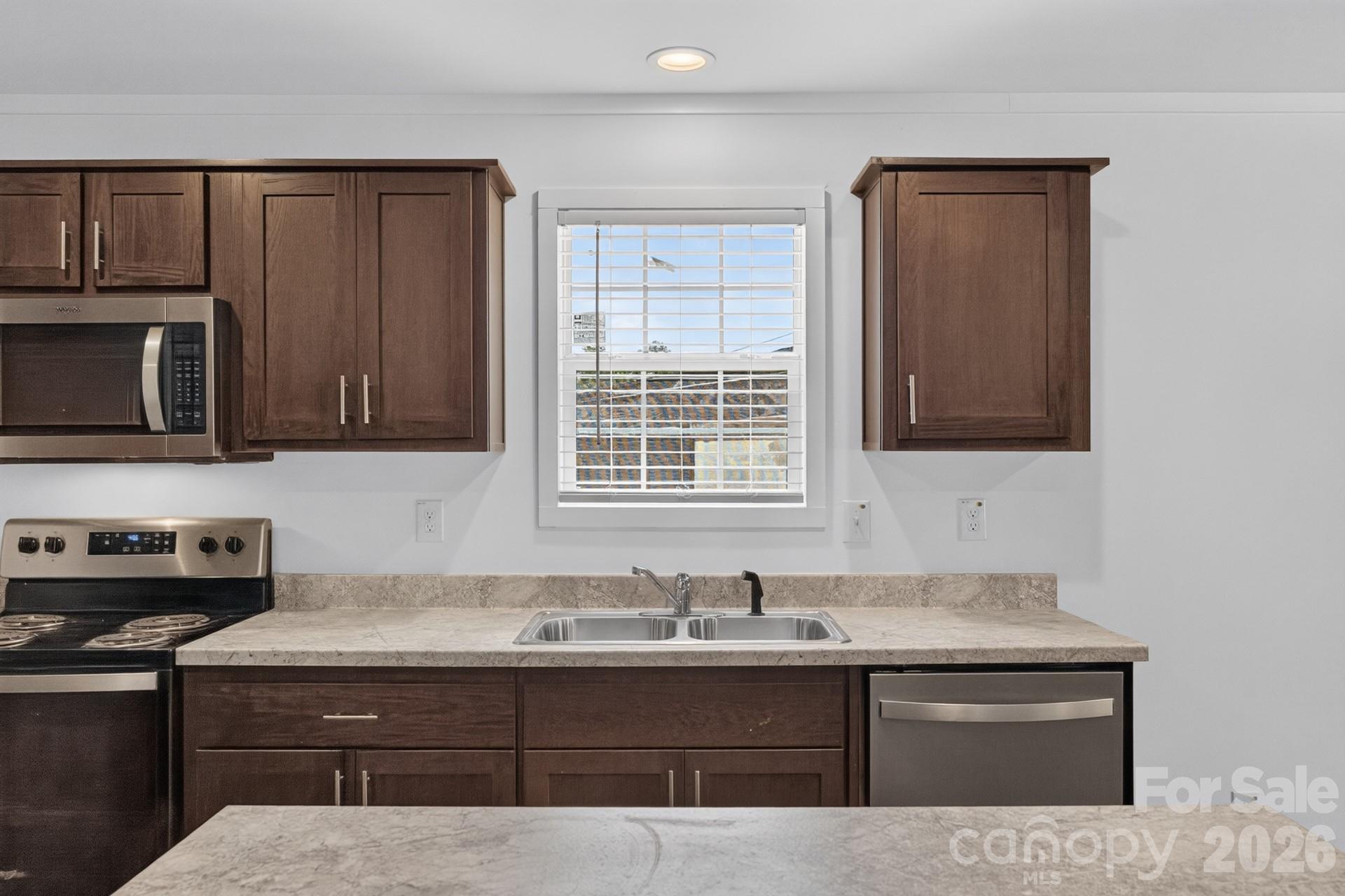 Kitchen window over sink - 1303 Elrado Street, Burlington